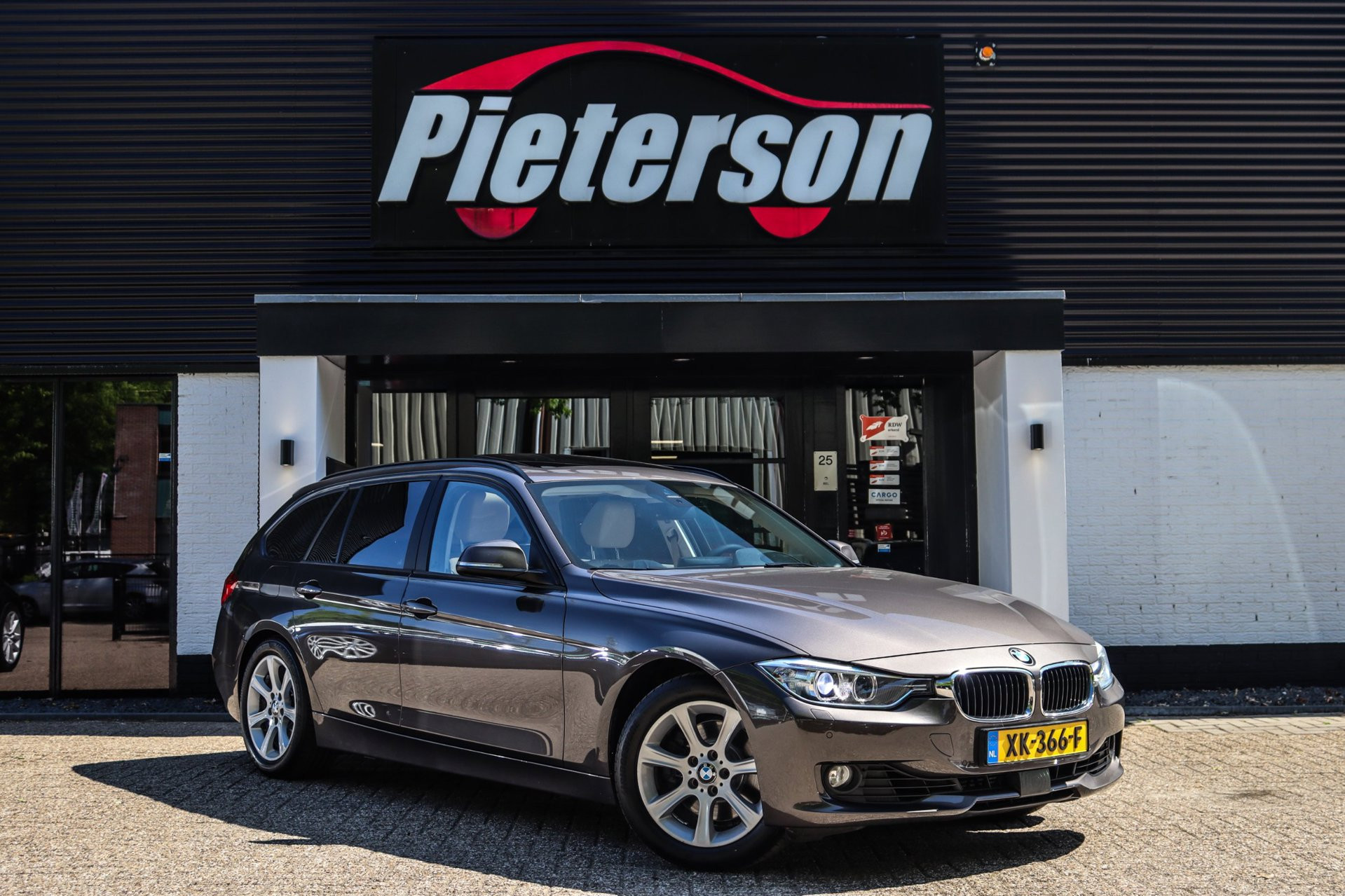 BMW 3-serie Touring 328i High Executive 2014 - voorkant