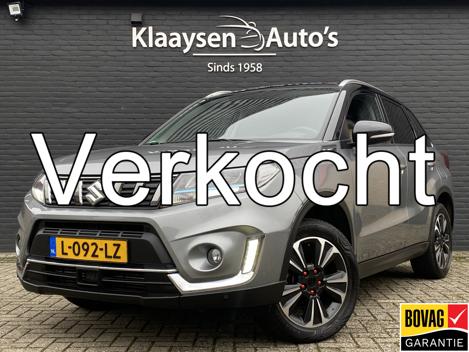 Suzuki Vitara 1.4 Boosterjet Style 140 pk Smart Hybrid | navigatie | adapt. cruise control | camera | two tone | trekhaak | stoelverw. 2021 - voorkant