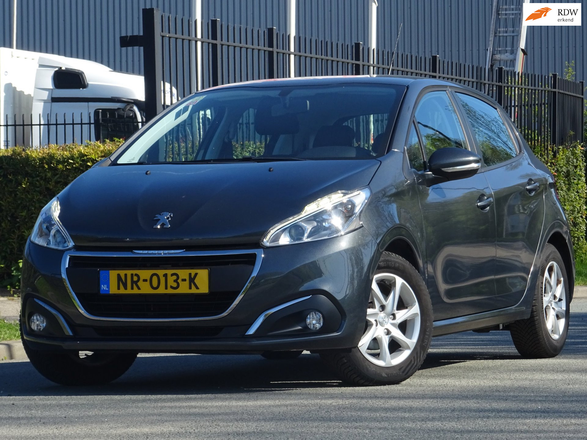 Peugeot 208 1.2 PureTech Blue Lease 5DRS NAVI/CAMERA/PDC/LED 2016 - voorkant