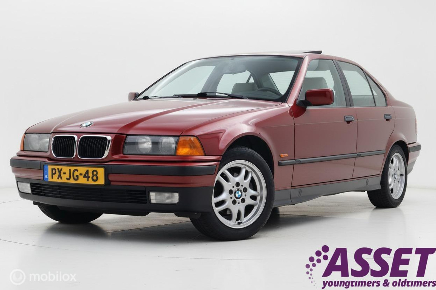 BMW 3er Reihe 320i 6-cilinder E36 5-bak | schuifdak | historie 1997 - voorkant