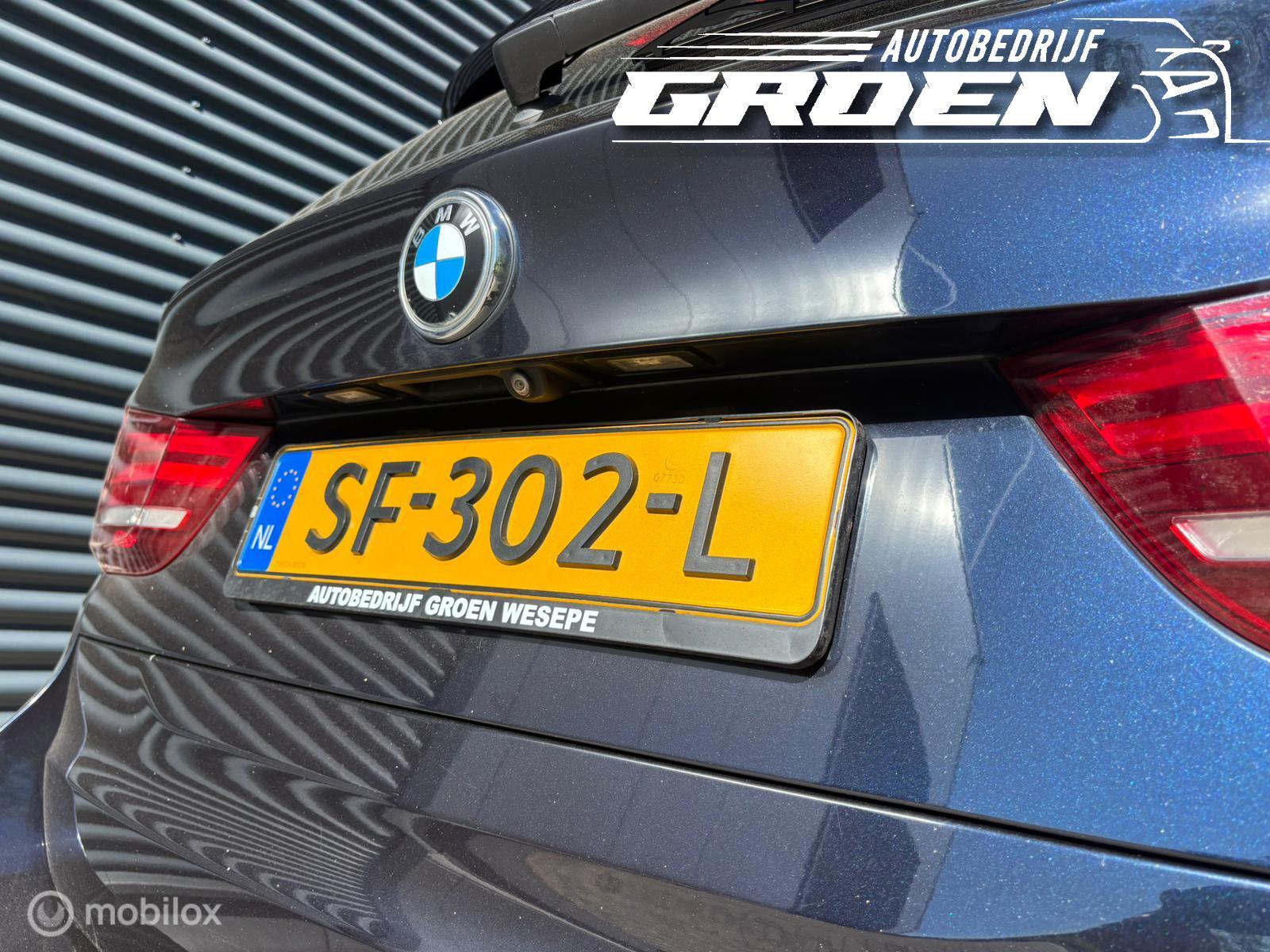 Foto van BMW X5 M50d