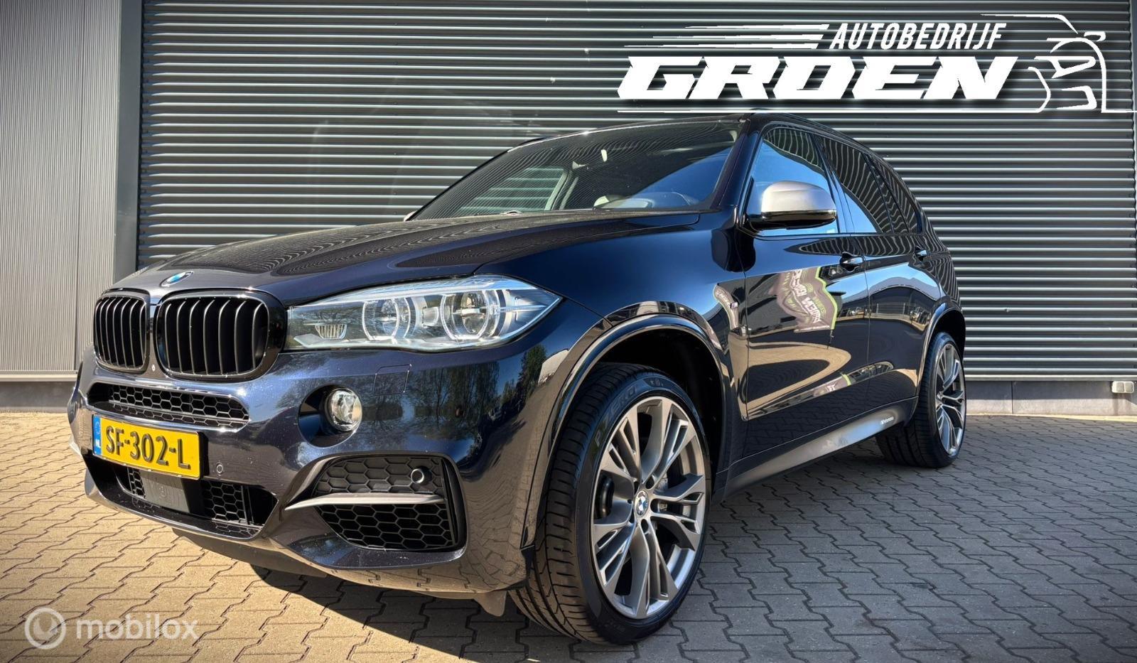 Foto van BMW X5 M50d