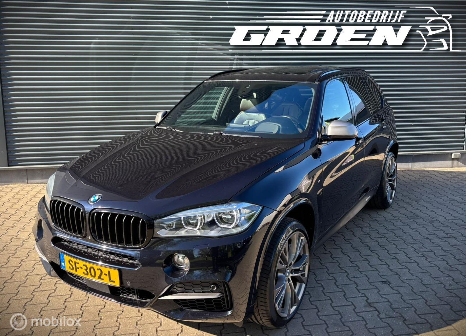 Foto van BMW X5 M50d