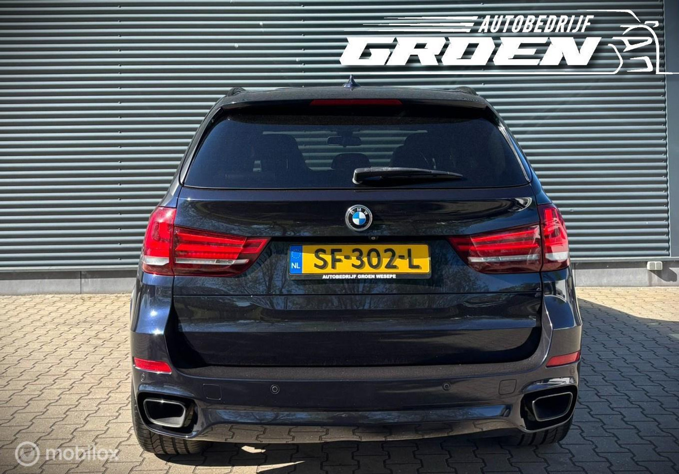 Foto van BMW X5 M50d