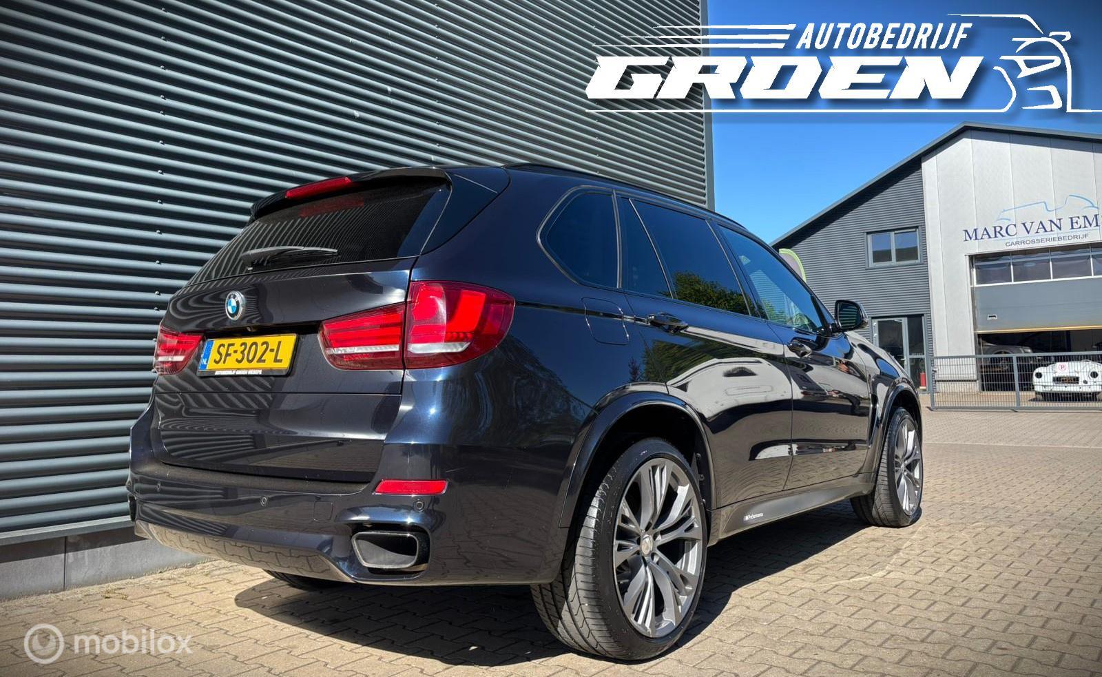 Foto van BMW X5 M50d