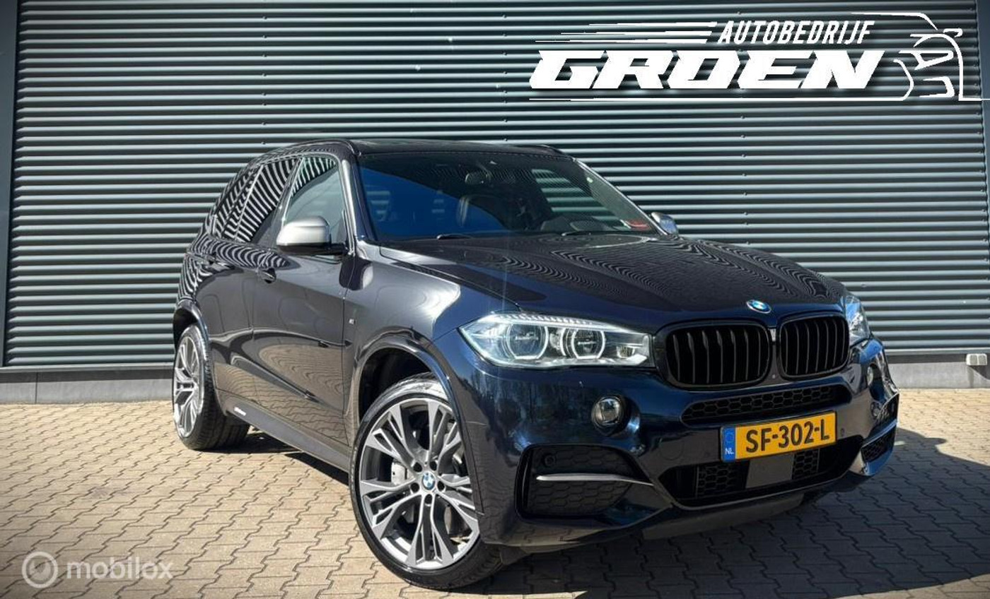Foto van BMW X5 M50d