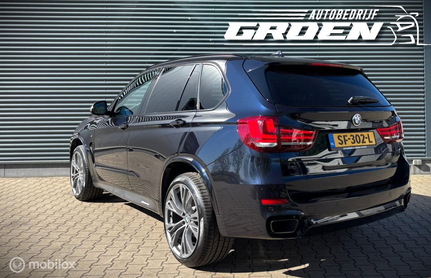 Foto van BMW X5 M50d