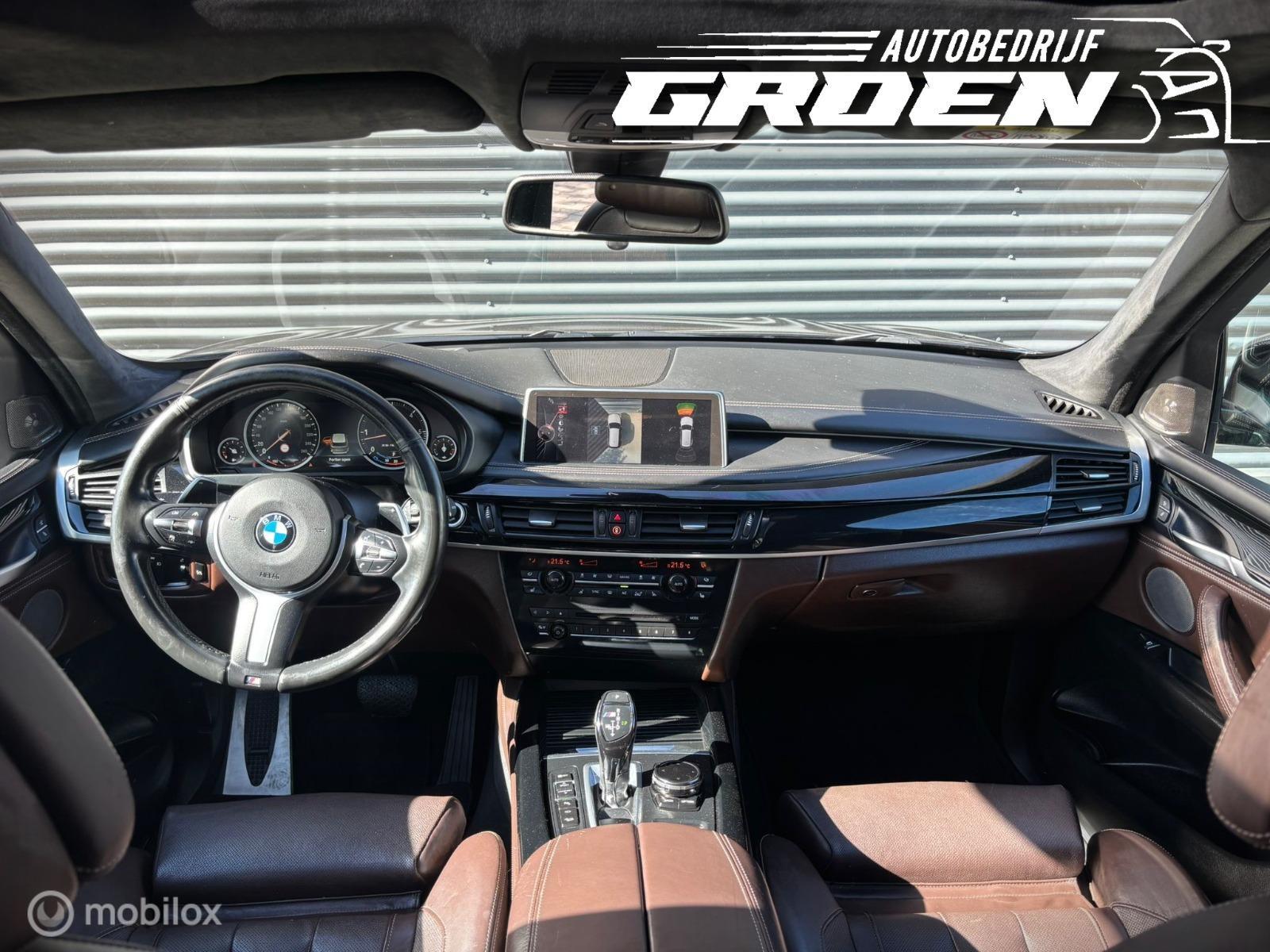 Foto van BMW X5 M50d