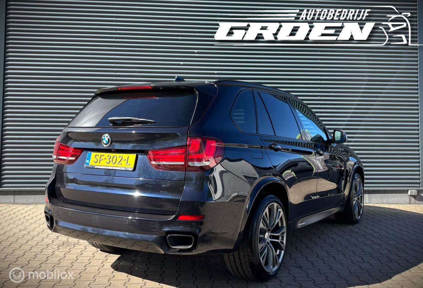 Foto van BMW X5 M50d
