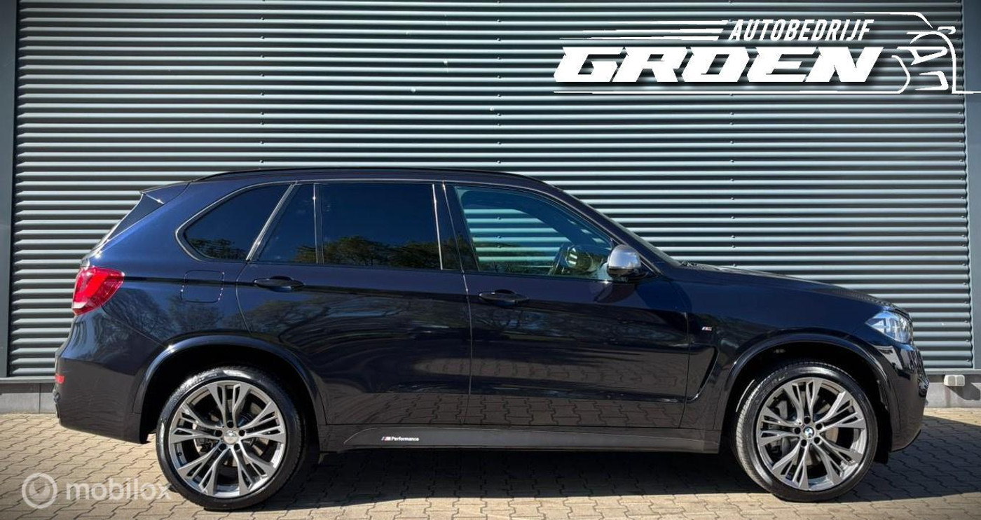 Foto van BMW X5 M50d