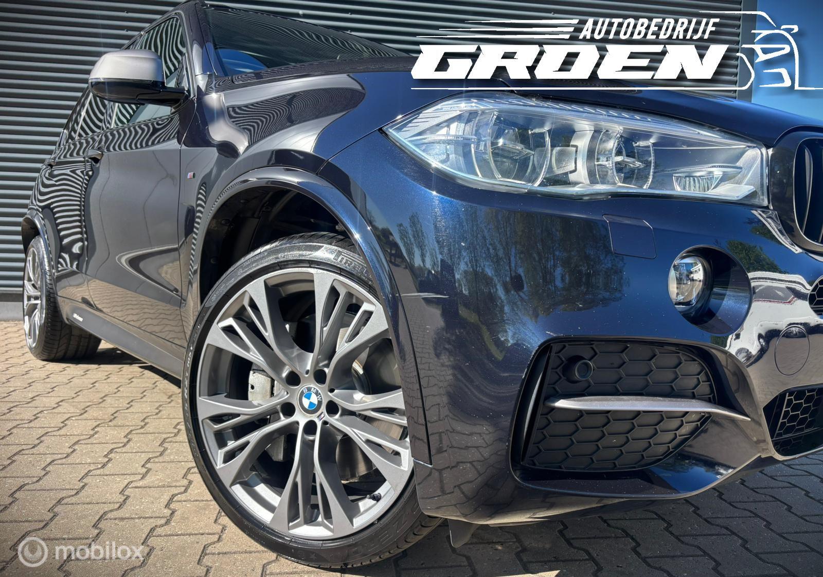 Foto van BMW X5 M50d