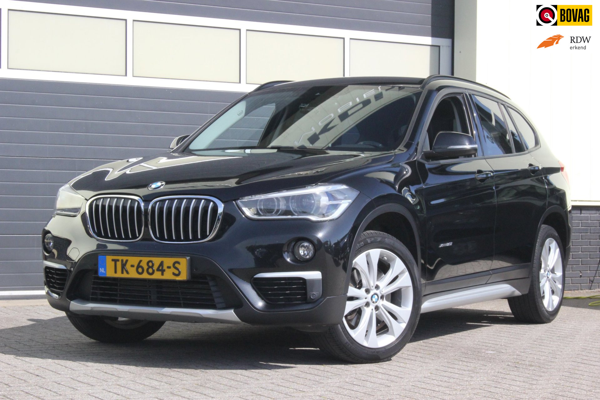 BMW X1 Xdrive20i XDrive20i High Executive xLine | Trekhaak | Leer | 2017 - voorkant
