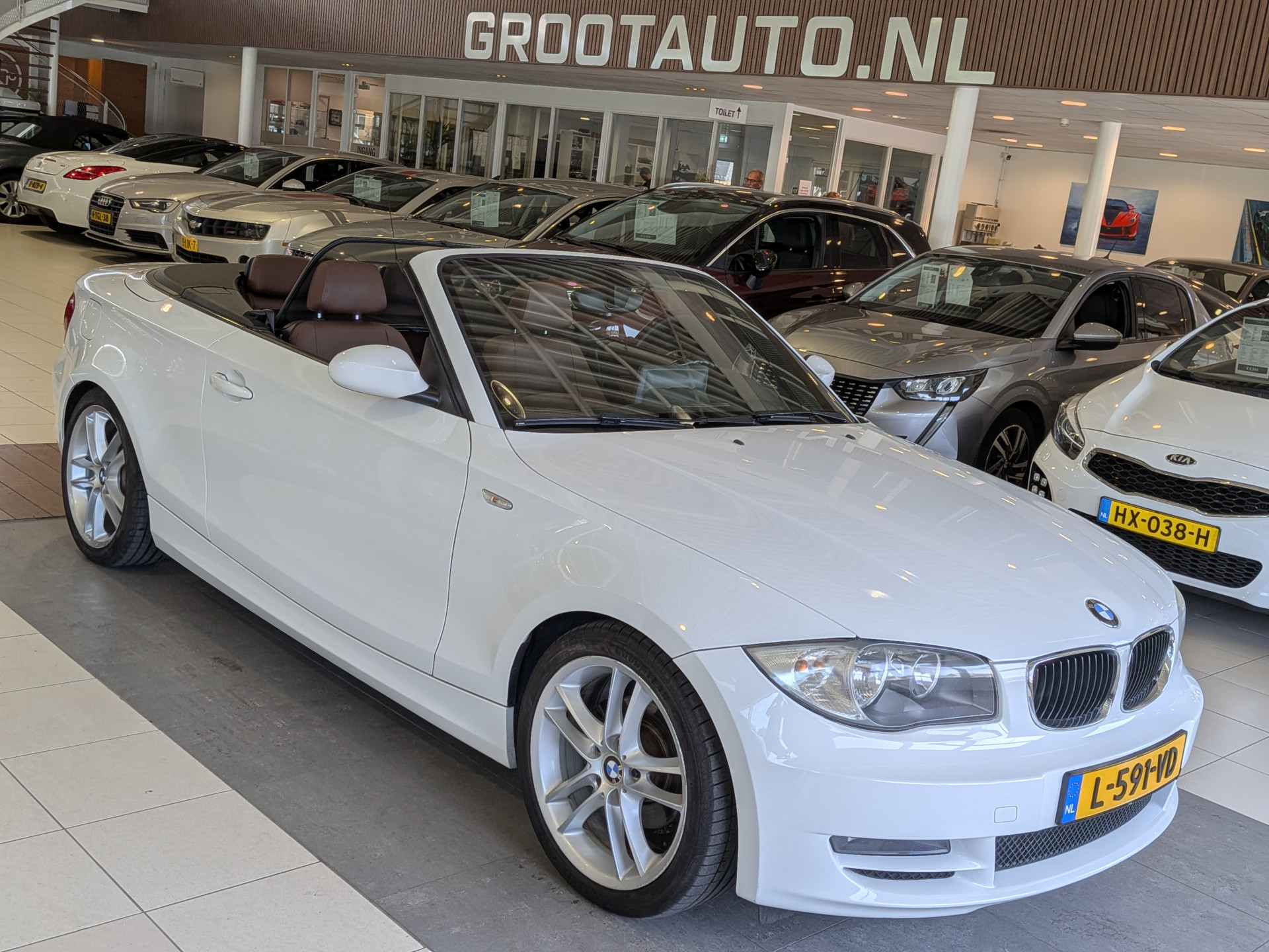 BMW 1er Reihe 118i 2009 - voorkant