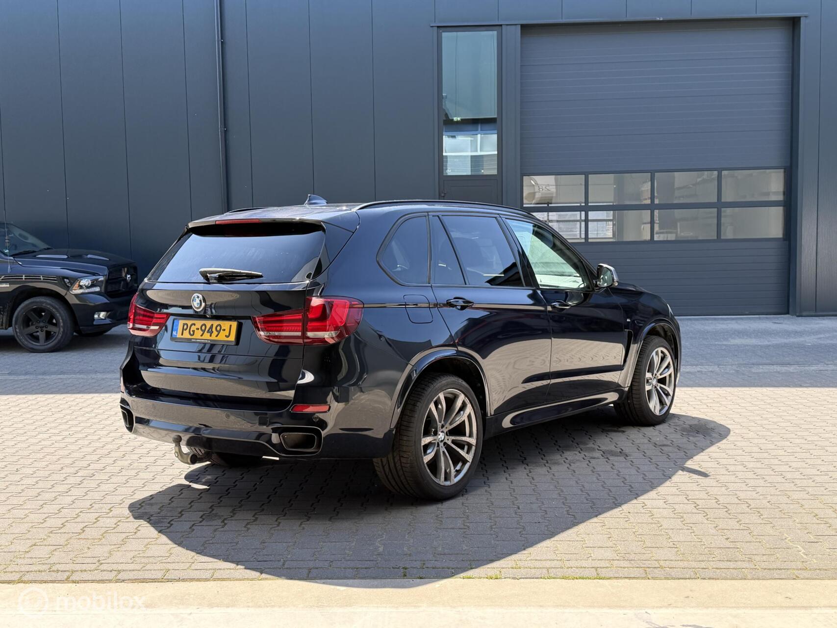 Foto van BMW X5 M50d