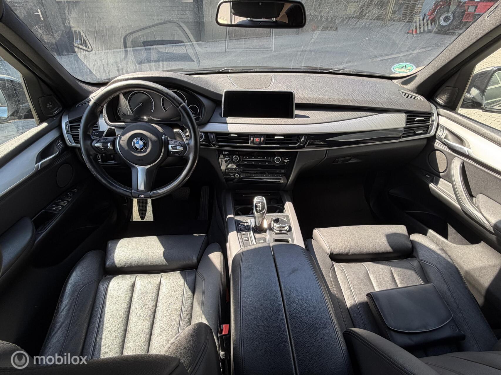 Foto van BMW X5 M50d