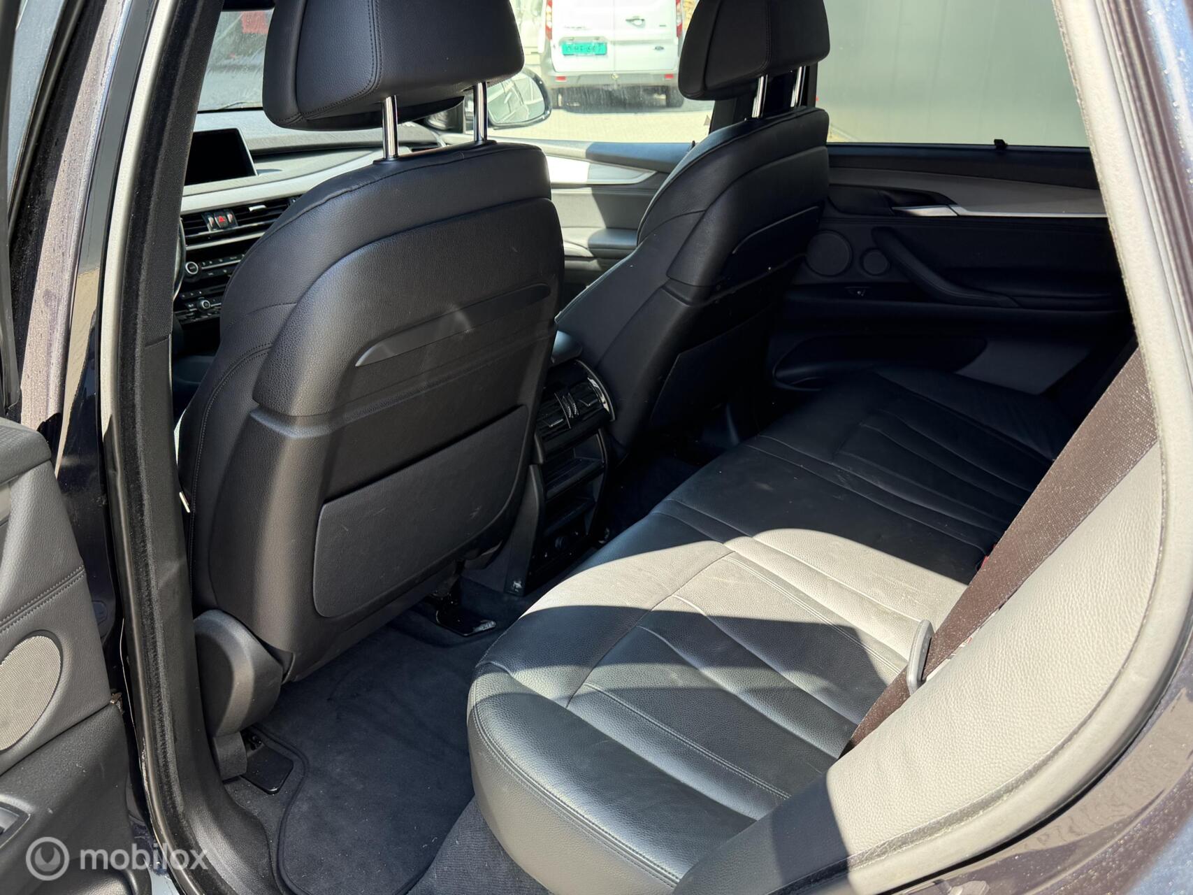 Foto van BMW X5 M50d