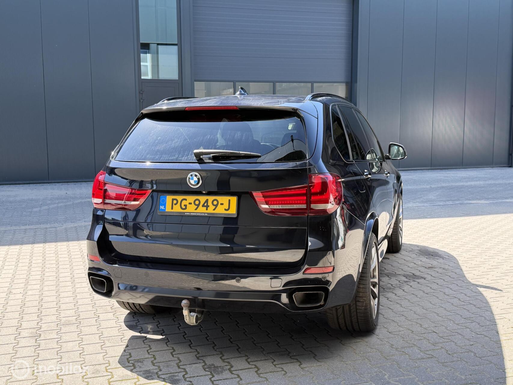 Foto van BMW X5 M50d