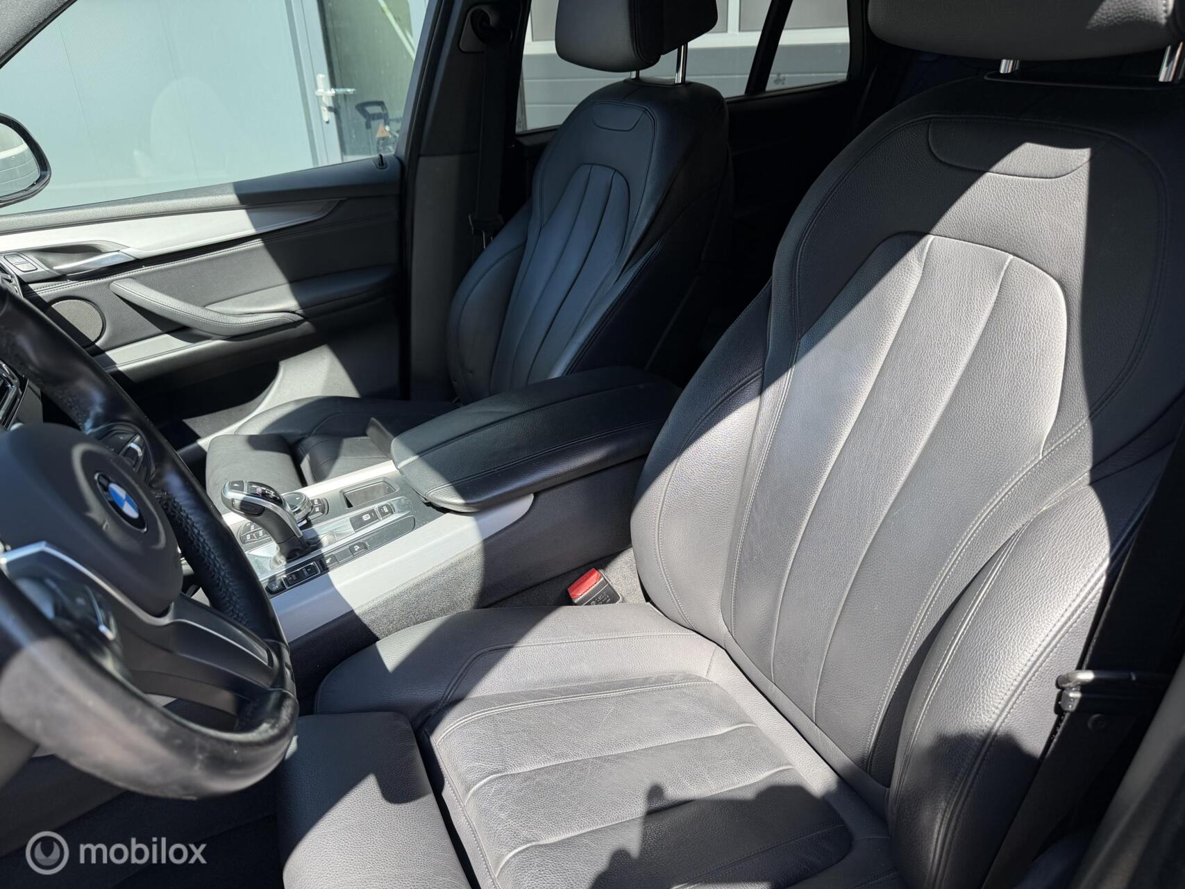 Foto van BMW X5 M50d
