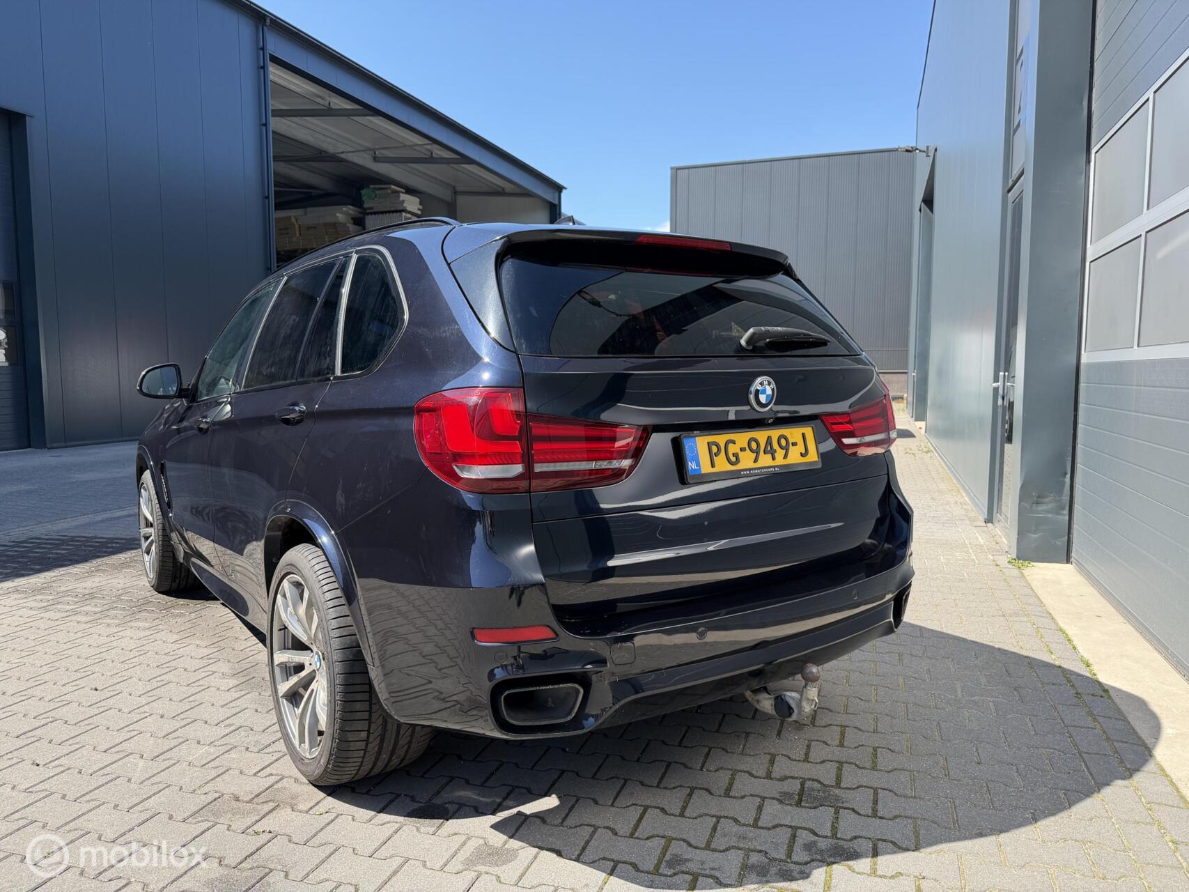 Foto van BMW X5 M50d