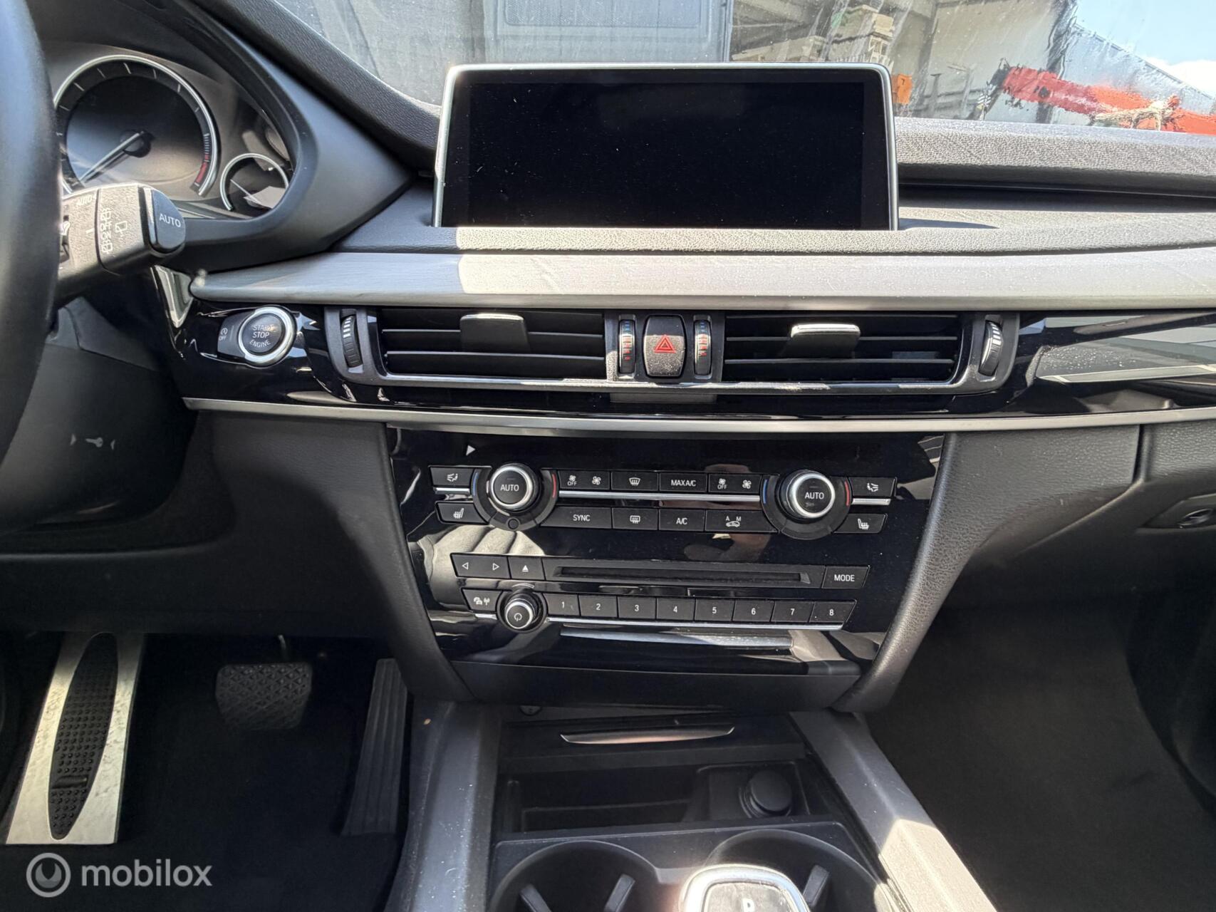 Foto van BMW X5 M50d