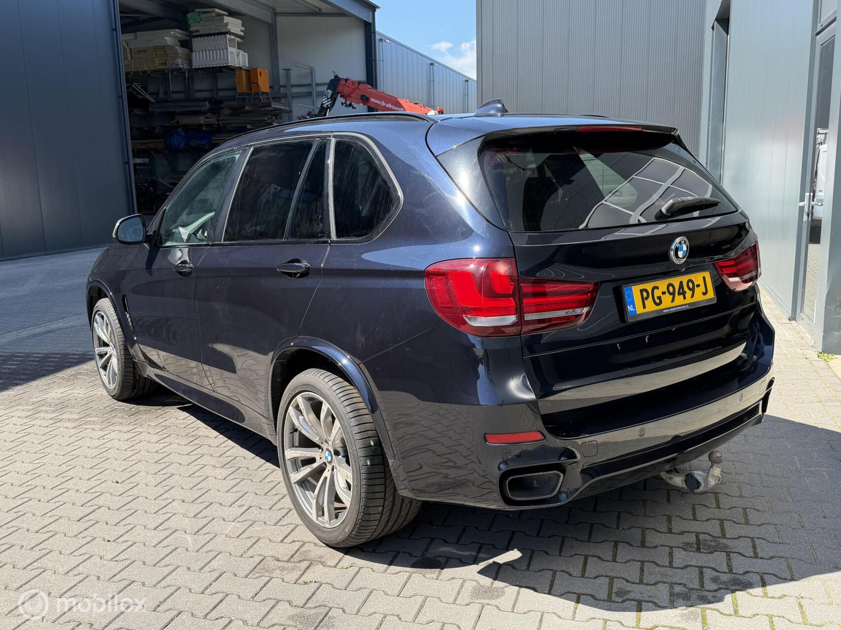 Foto van BMW X5 M50d