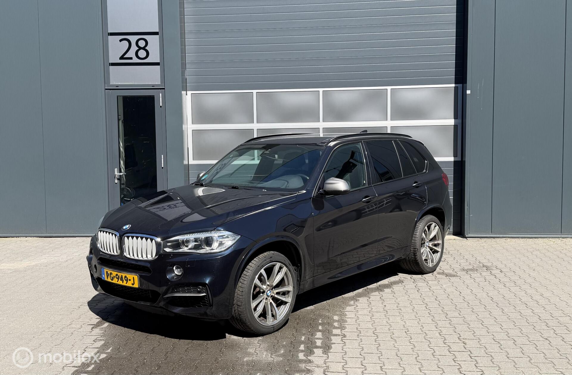 Foto van BMW X5 M50d