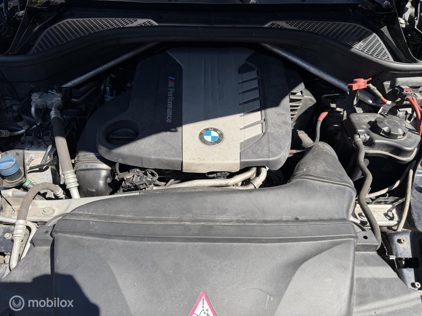 Foto van BMW X5 M50d