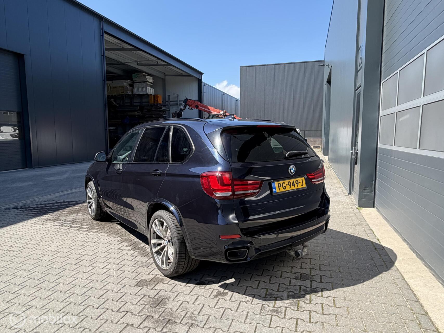 Foto van BMW X5 M50d