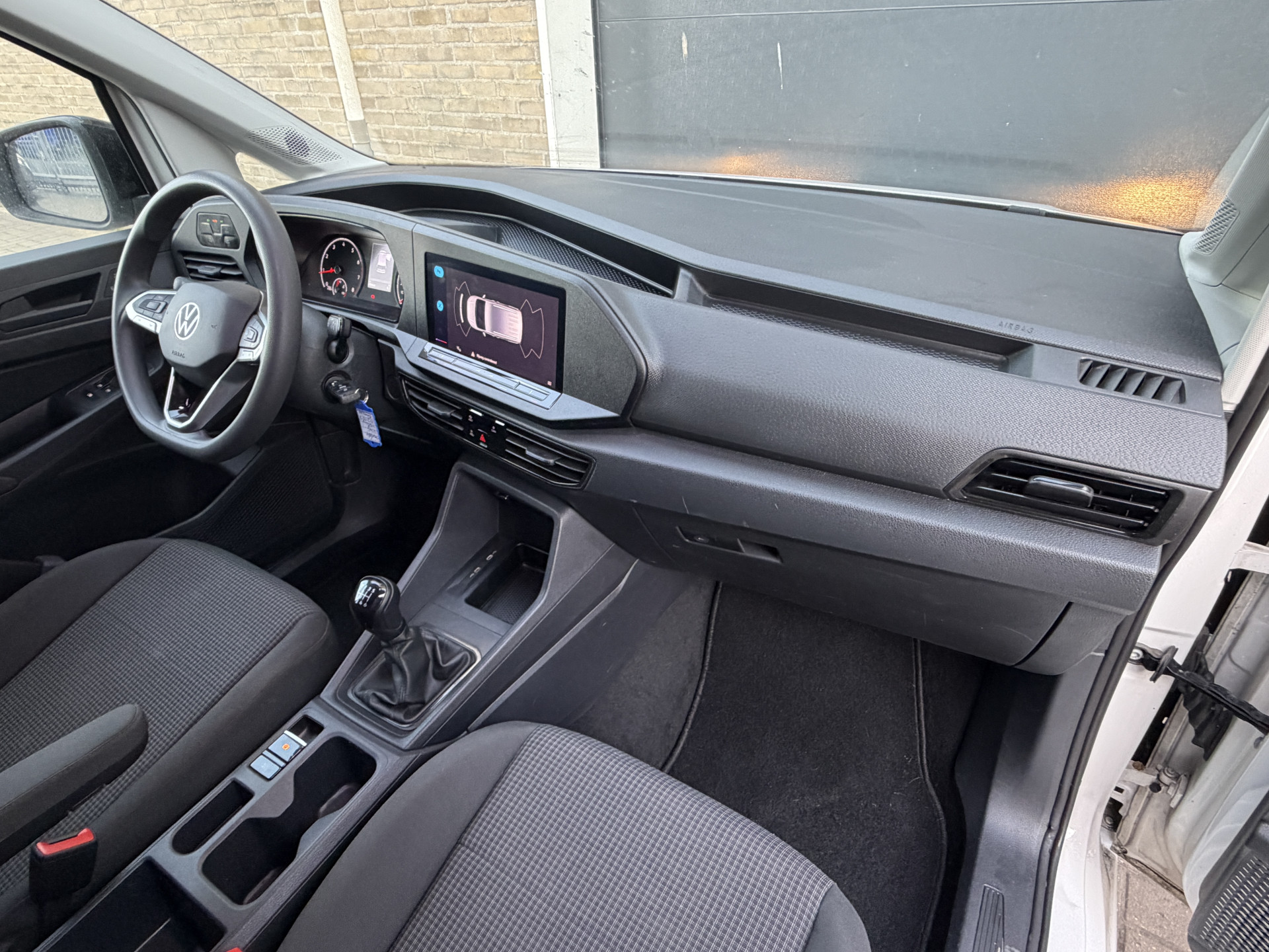 Foto van Volkswagen Caddy Modified Partition Wall
