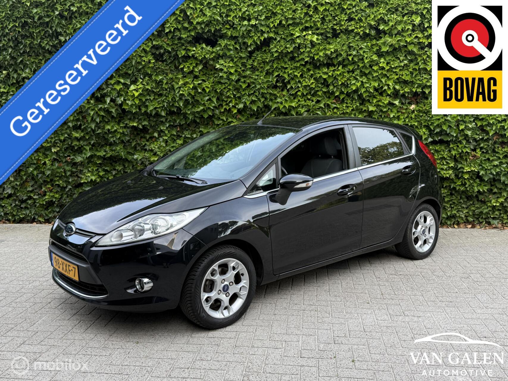 Ford Fiesta 1.25 Titanium Netjes! Airco|Cruise|Trekhaak|4S 2012 - voorkant