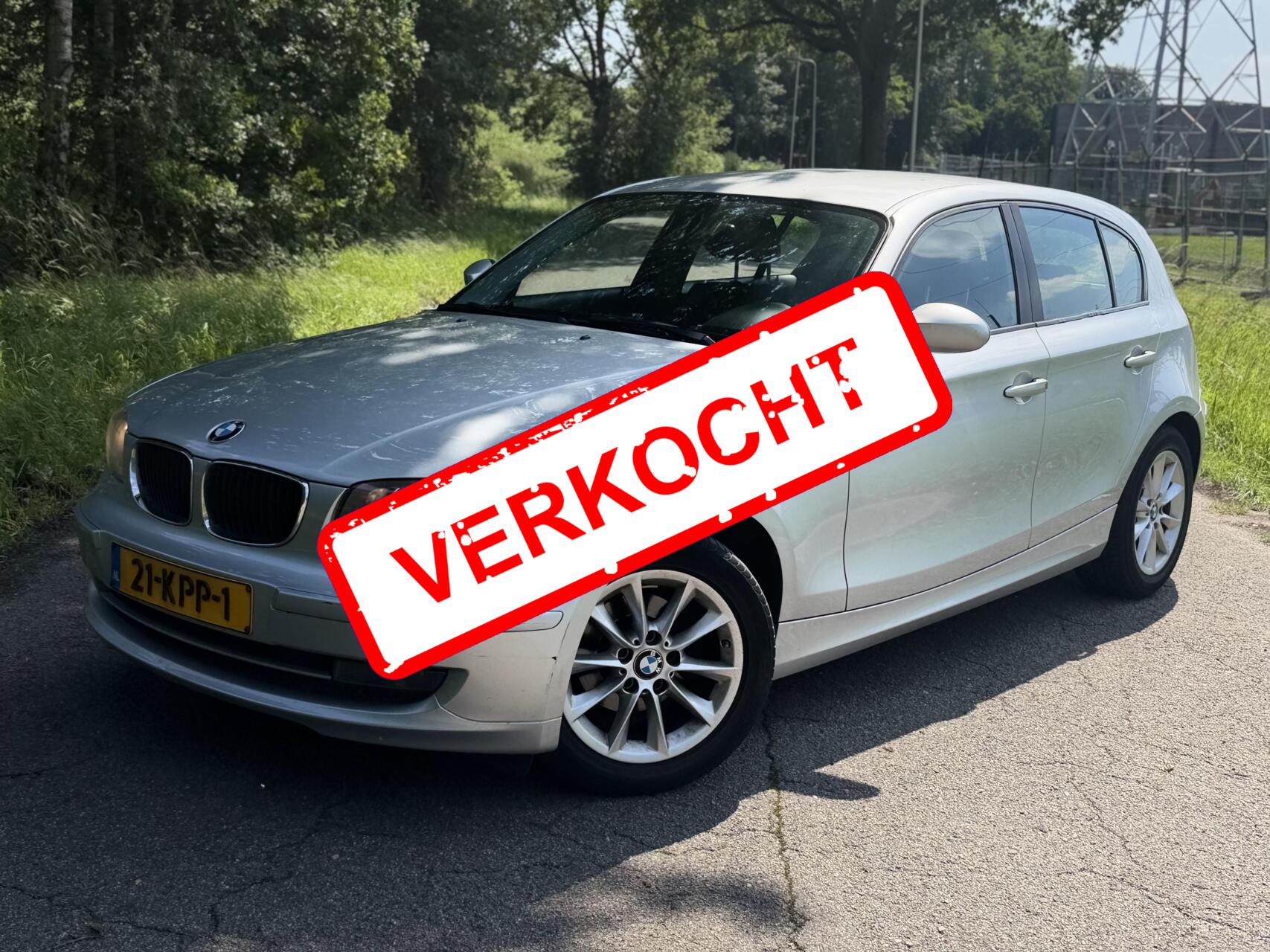 BMW 1er Reihe 116i Executive 2010 - voorkant