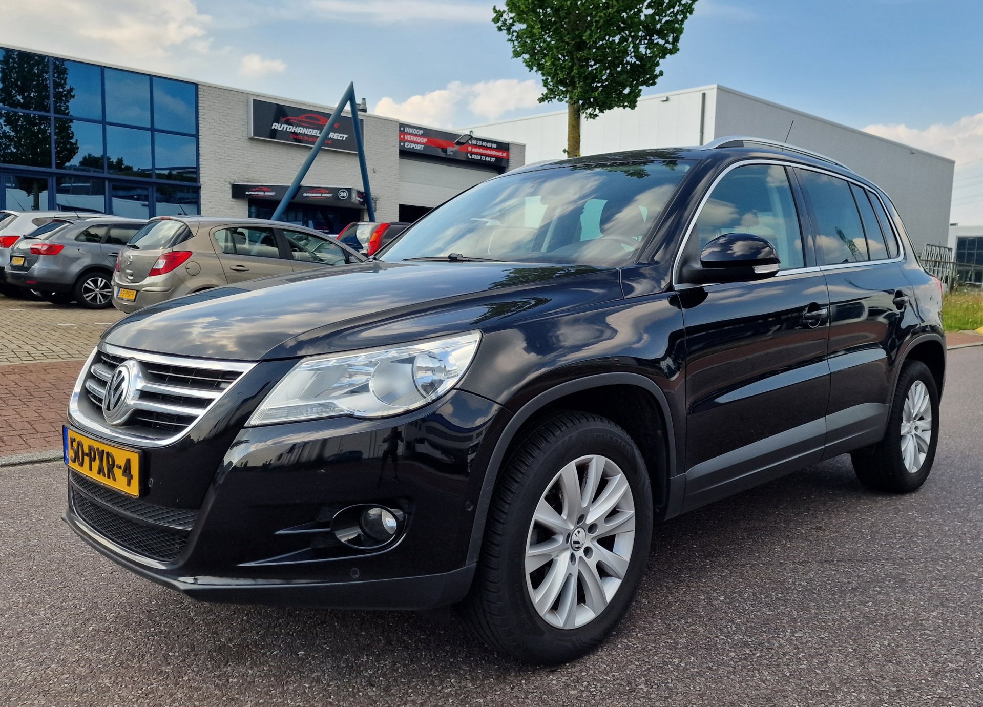 Volkswagen Tiguan 1.4 TSI Sport&Style NAVI PSENSOR CRUISE 2 X SLEUTELS TREKHAAK 2011 - voorkant