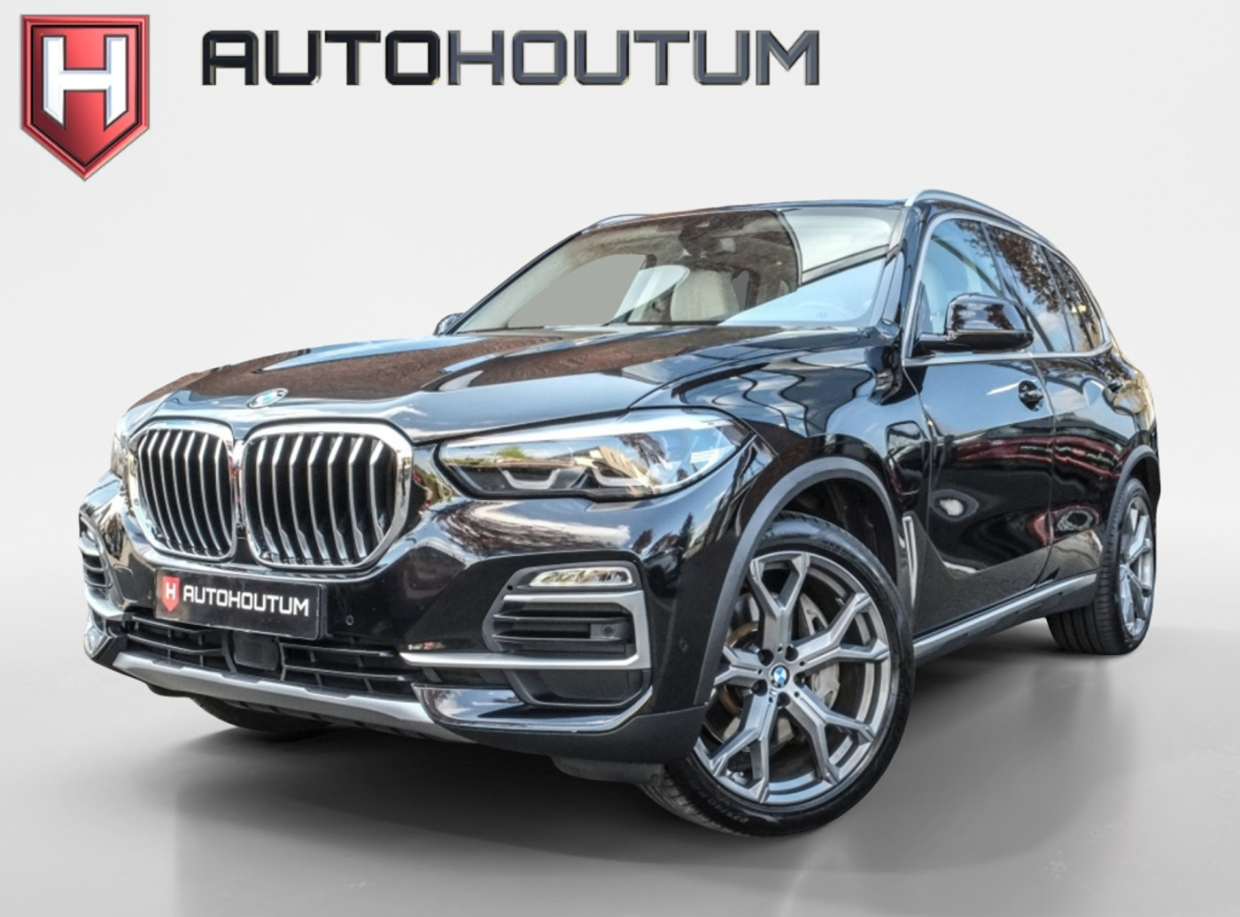 BMW X5 Xdrive45e xDrive45e High Executive | SOH 90% | Panoramadak | Leder 2020 - voorkant