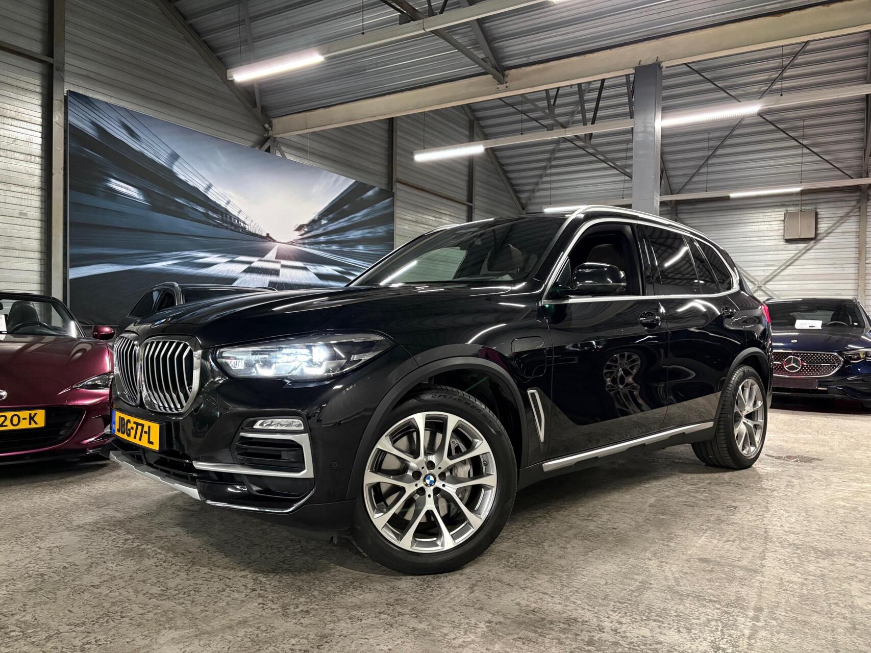 BMW X5 xDrive45e High Executive | Pano | HUD | Trekhaak 2021 - voorkant
