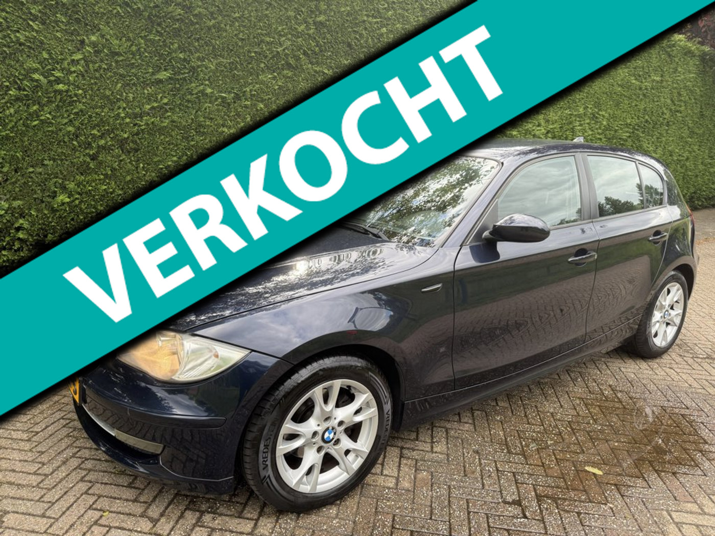 BMW 1er Reihe 116i Business Line 2009 - voorkant