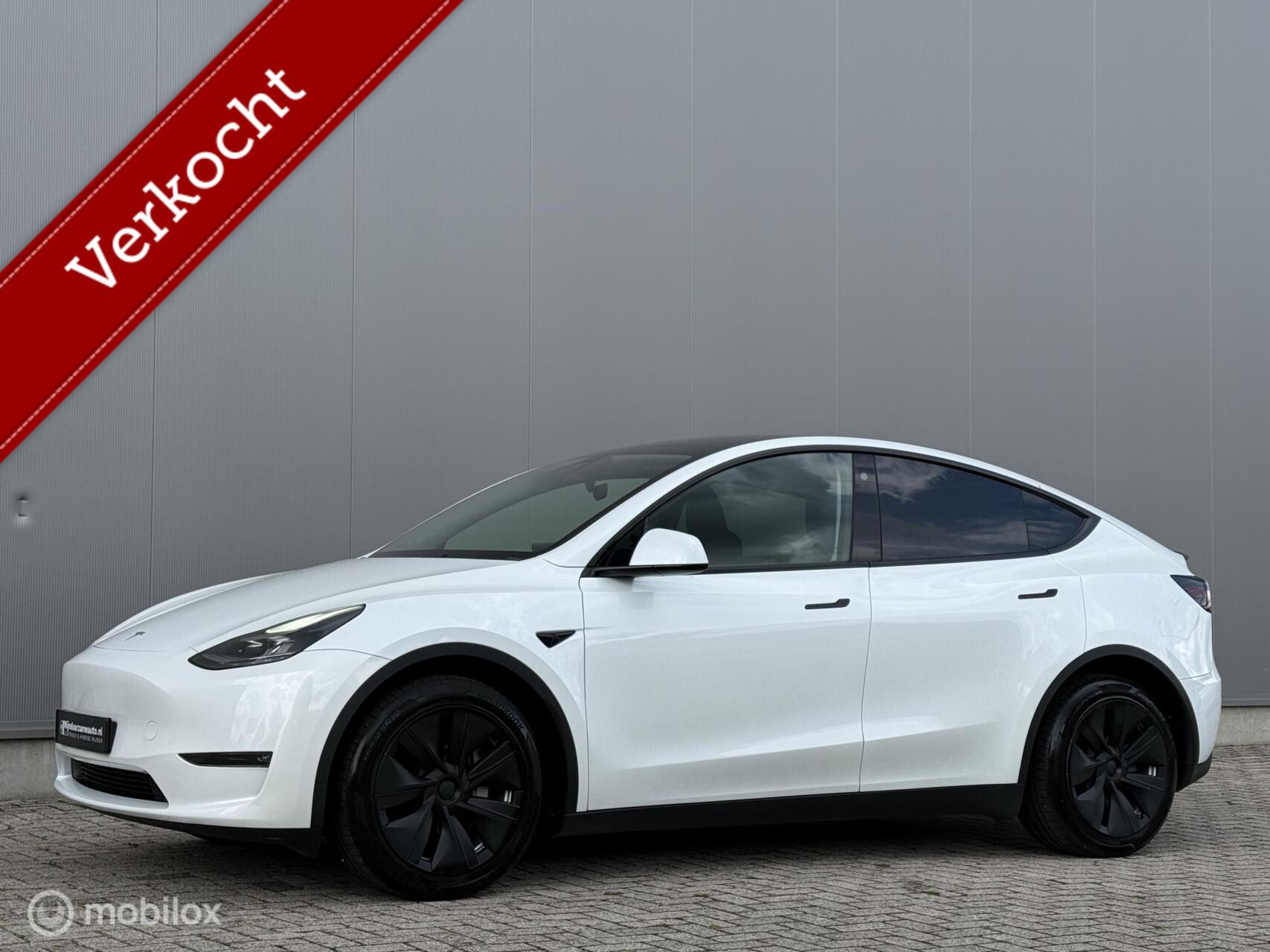 Tesla Model Y Long Range AWD 75 kWh - SOH 95 % - Trekhaak 2023 - voorkant