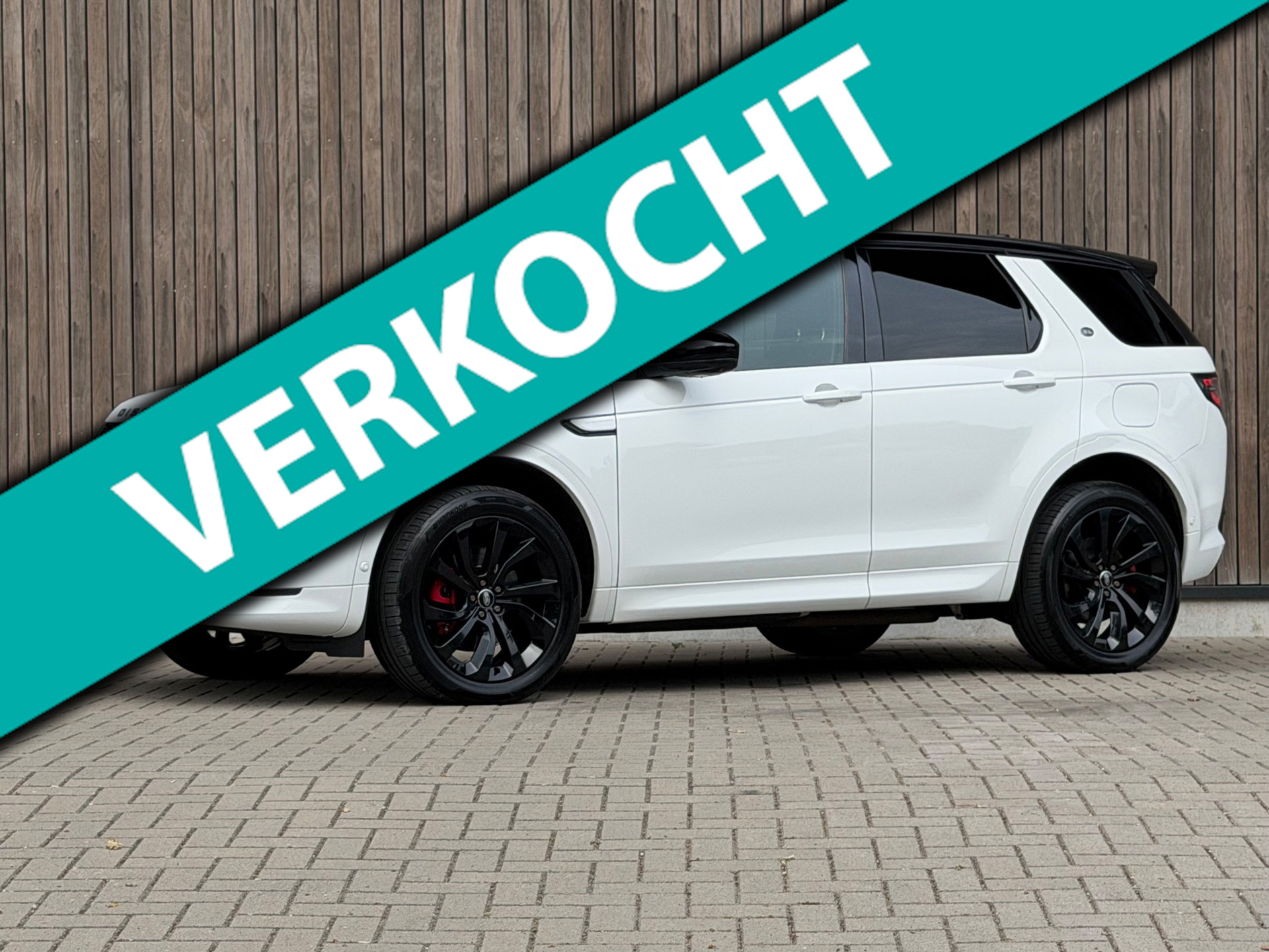 Land Rover Discovery Sport P300e 1.5 R-Dynamic HSE / Trekhaak 2022 - voorkant