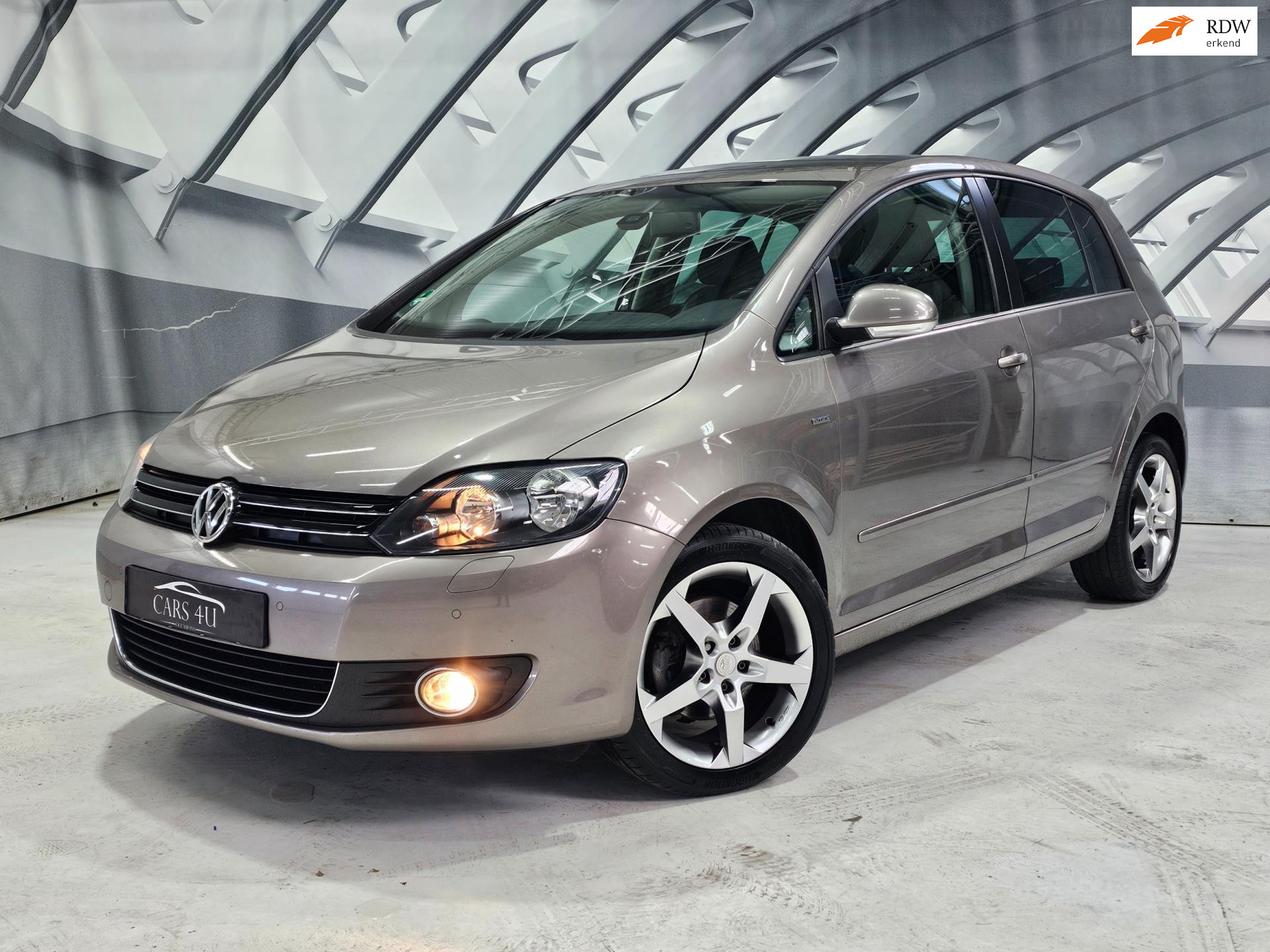 Volkswagen Golf Plus 1.6 TDI Trendline BlueMotion 2013 - voorkant