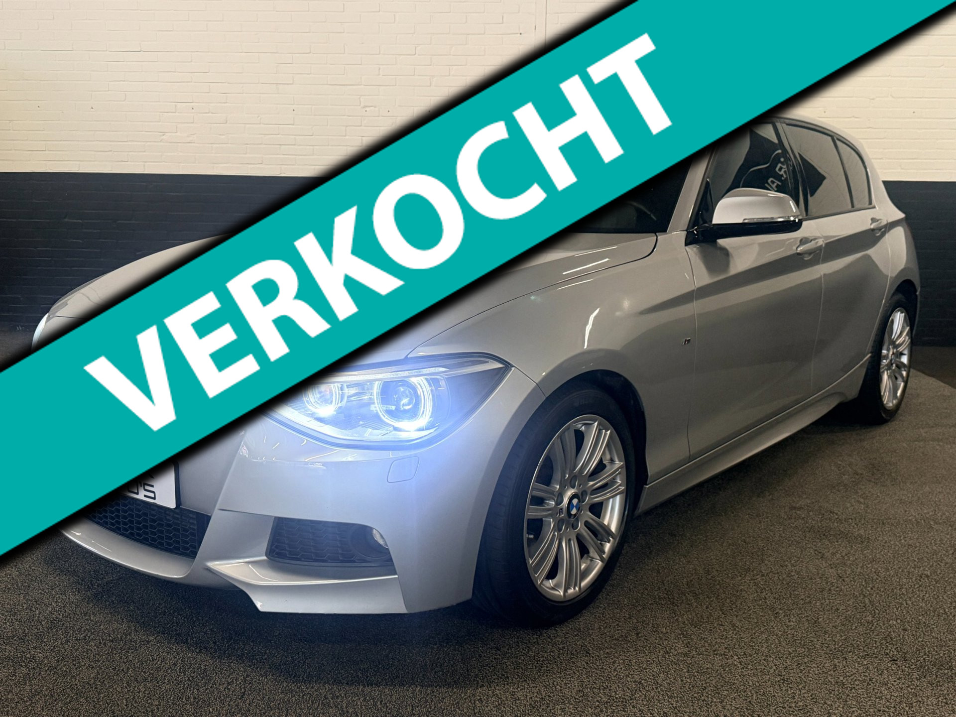 BMW 1-serie 116i Executive 2014 - voorkant