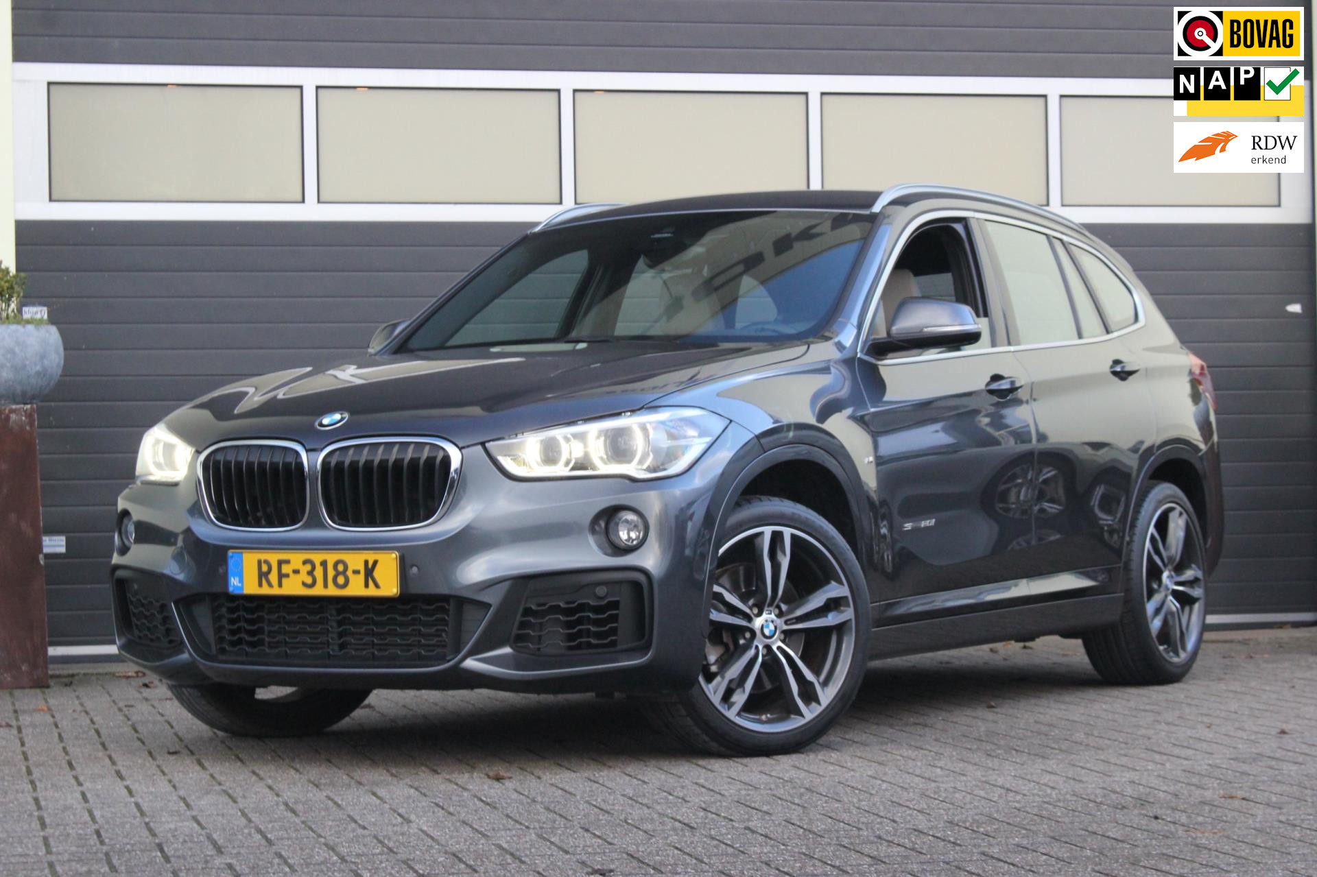 BMW X1 Sdrive20i SDrive20i High Executive M Sport | Trekhaak | 2017 - voorkant