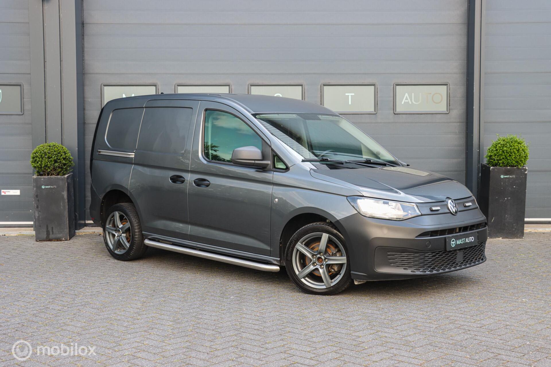 Foto van Volkswagen Caddy Modified Partition Wall