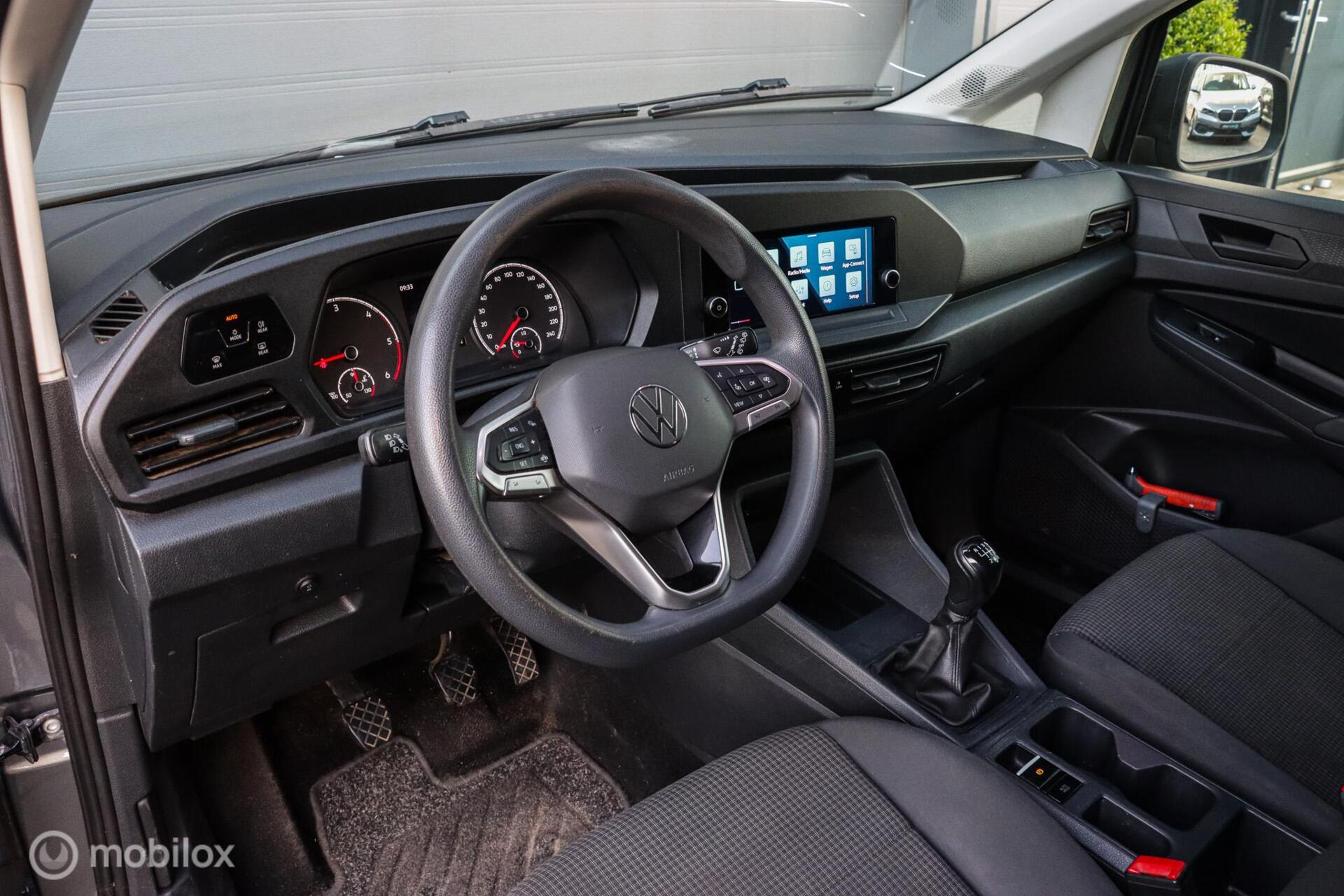 Foto van Volkswagen Caddy Modified Partition Wall