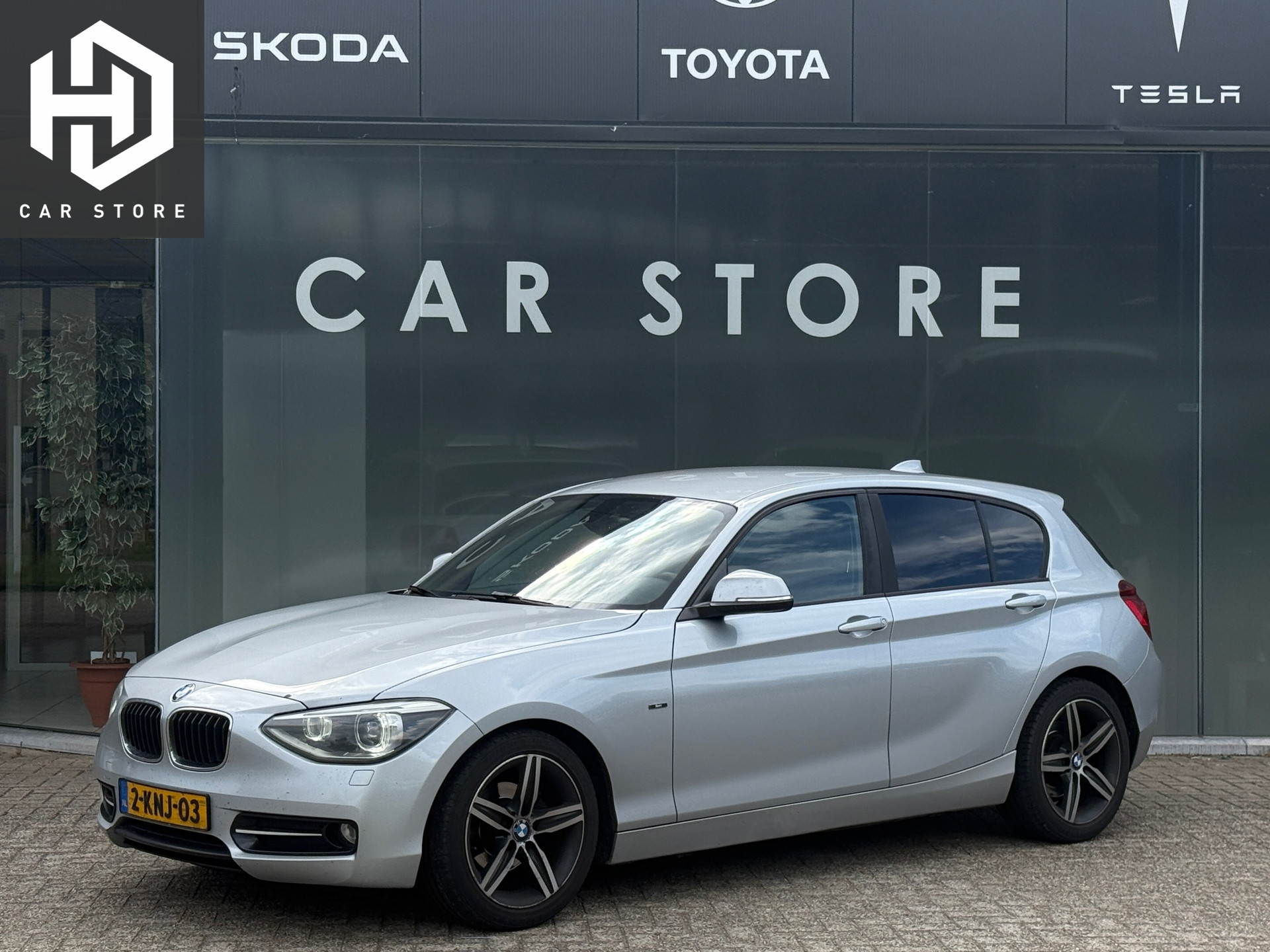 BMW 1er Reihe 116i EDE Business Navi|Leder|PDC|Stoelverwarming 2013 - voorkant