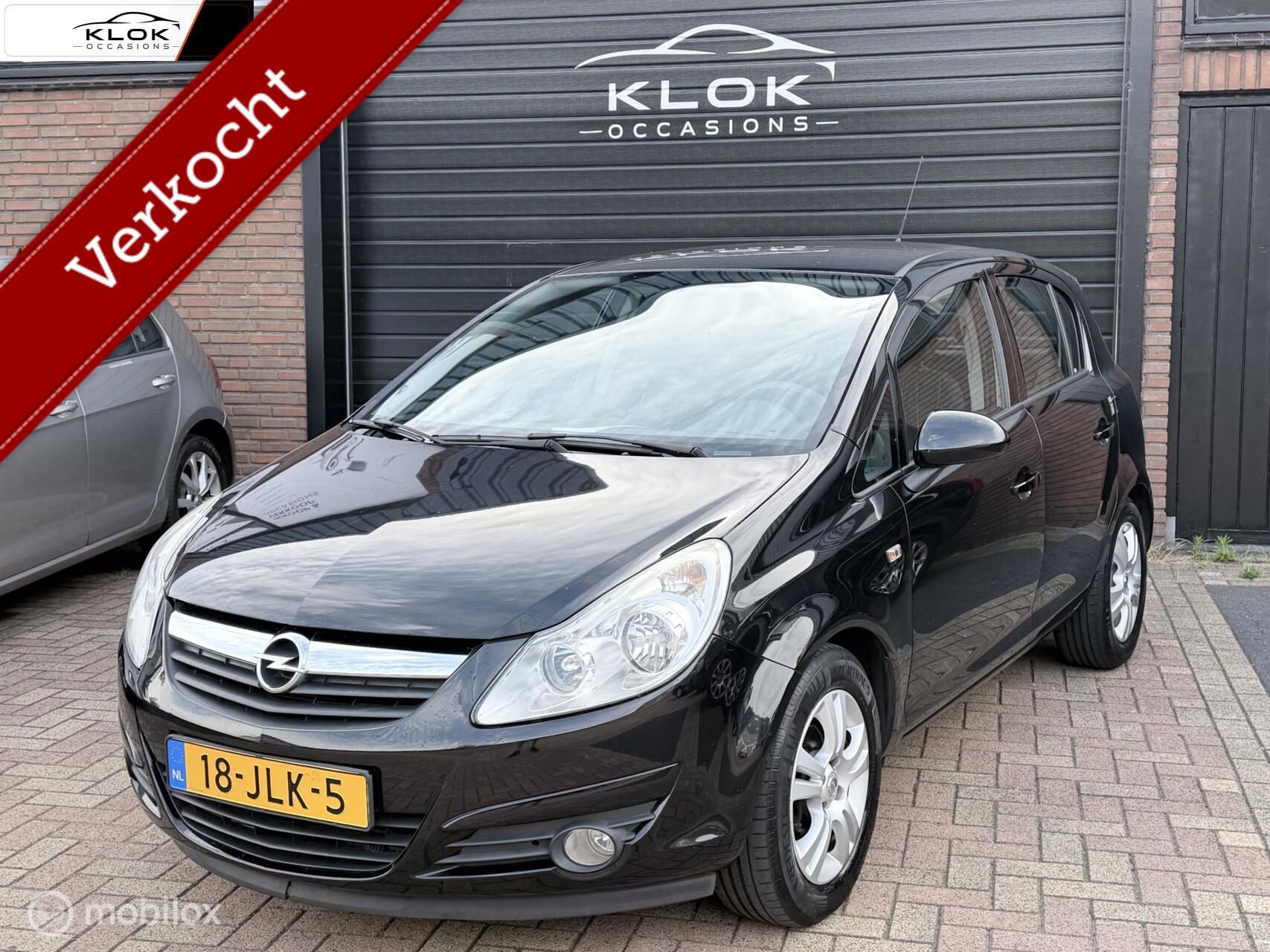 Opel Corsa 1.2-16V Enjoy NAP Airco Cruise 5Deurs 2009 - voorkant