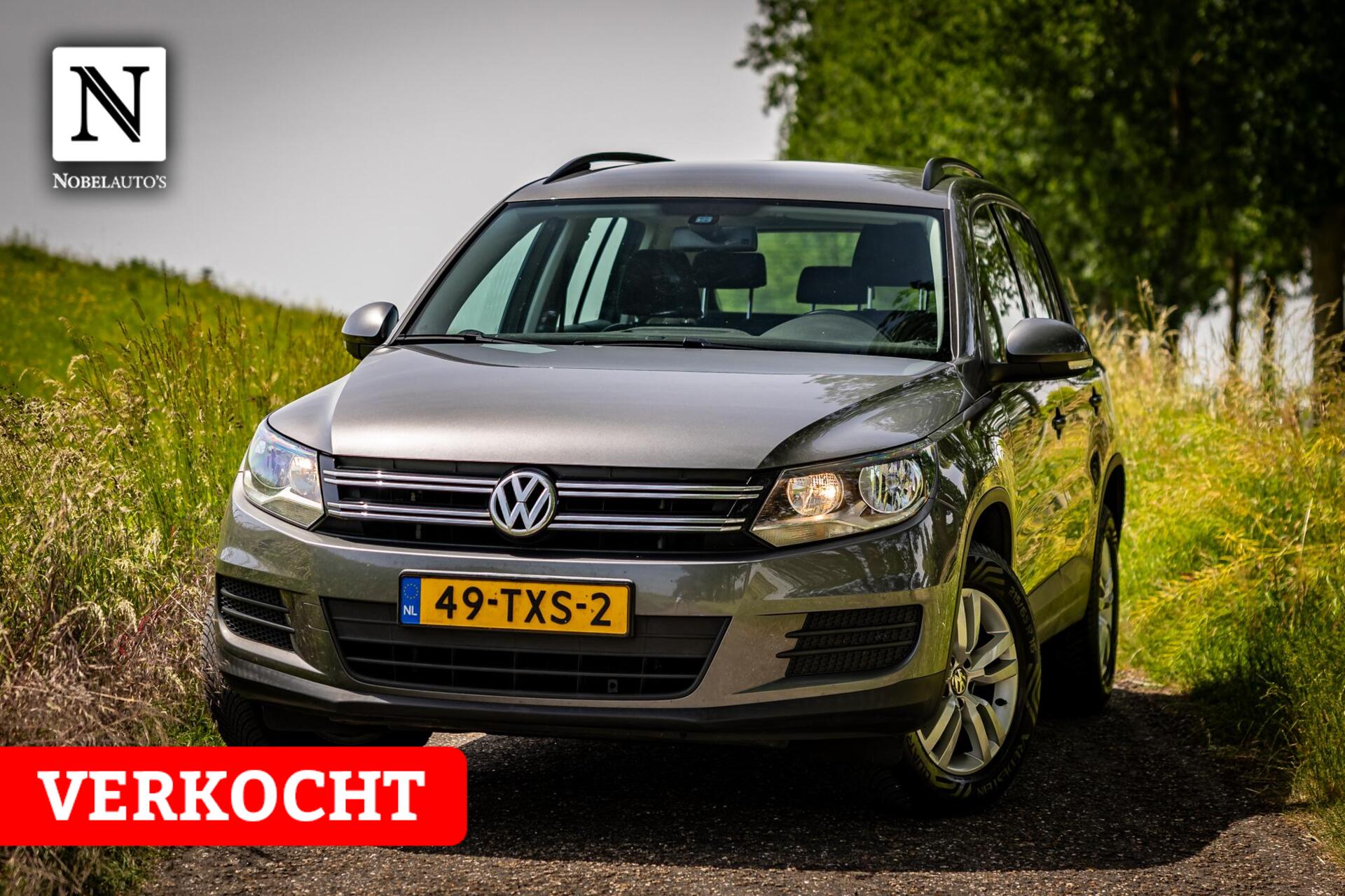 Volkswagen Tiguan 1.4 TSI Sport&Style |Nap |Trekhaak |Dealer 2012 - voorkant