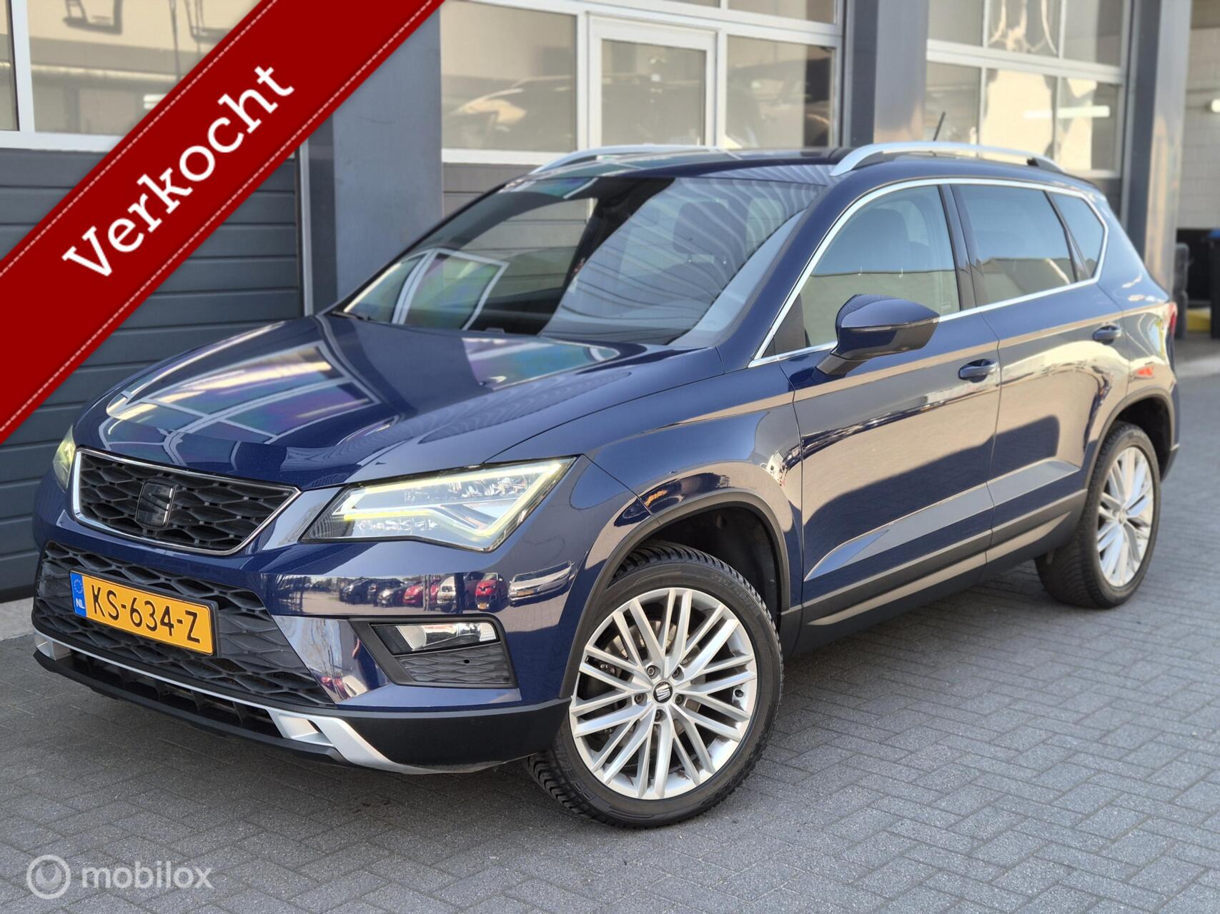 Seat Ateca 1.4 EcoTSI Xcellence Automaat | LED | PDC | ELEK. TREKHAAK | NAVI | CAMERA | 2016 - voorkant