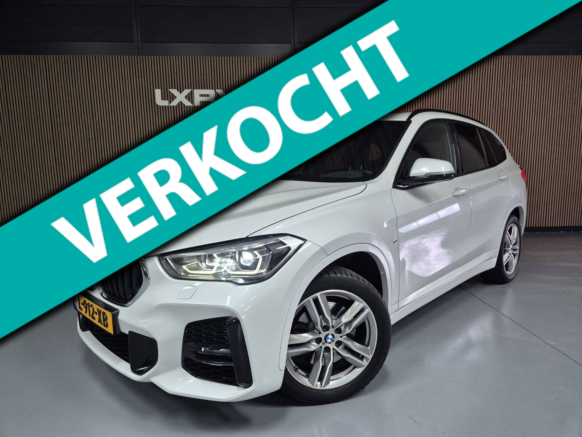 BMW X1 Xdrive20i XDrive20i High Executive | Clima | Navi | Pano | Cruise | Camera | Stoelverwarming | 2019 - voorkant