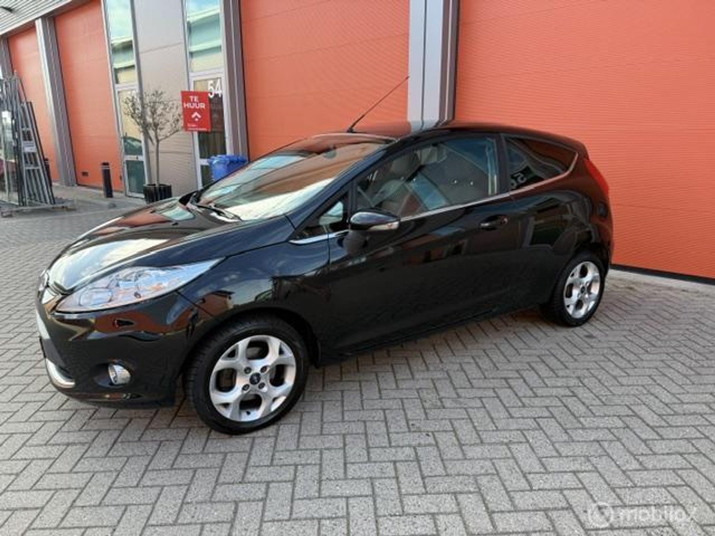 Ford Fiesta 1.25 Ghia 3 DRS -APK- VEEL EXTR'S-KM NAP 2009 - voorkant