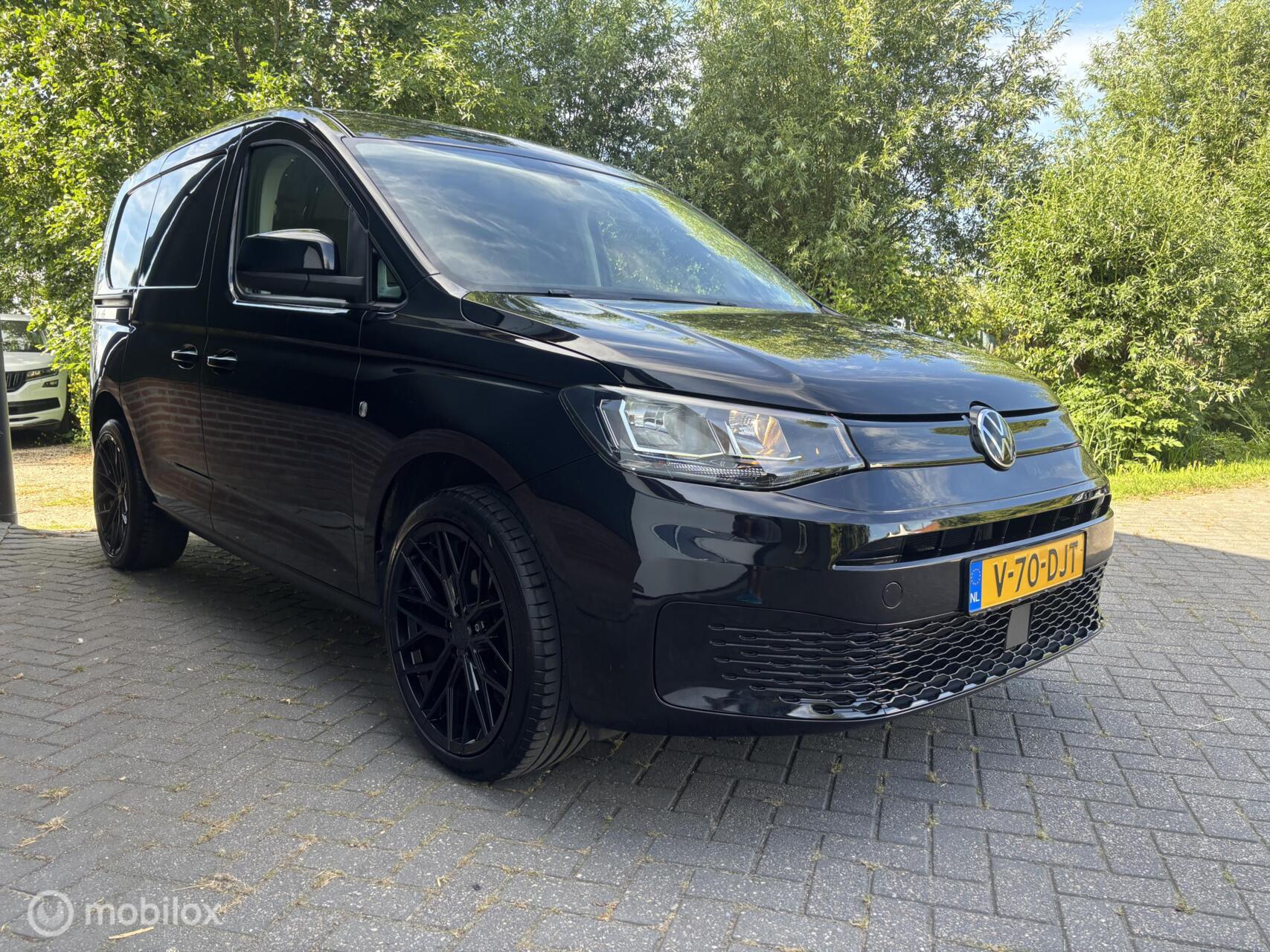 Foto van Volkswagen Caddy Modified Partition Wall