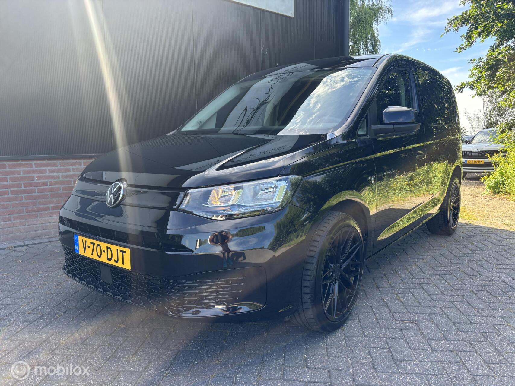 Foto van Volkswagen Caddy Modified Partition Wall